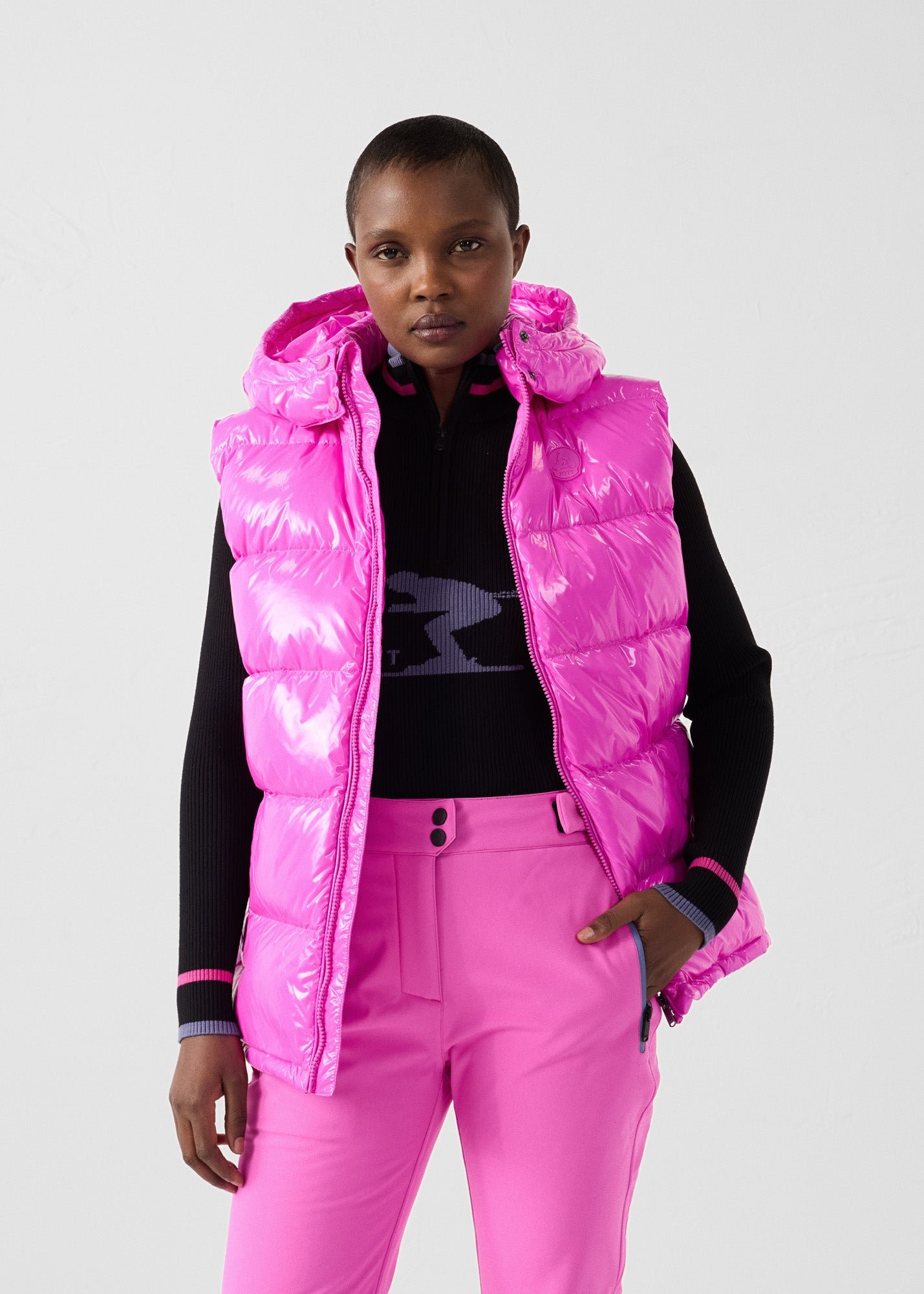 Padded sleeveless down jacket for extreme cold weather. JOTT Pink