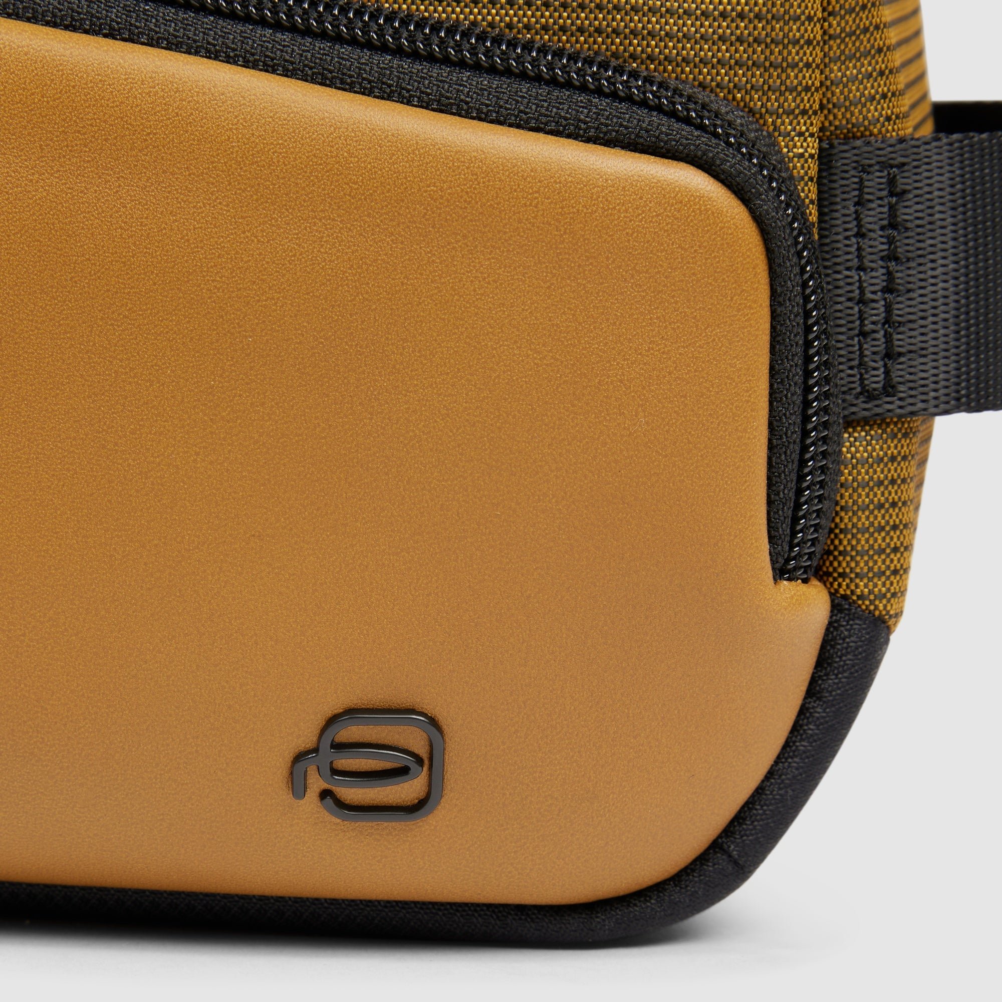 Toiletry bag made from bio-based material PIQUADRO Brown