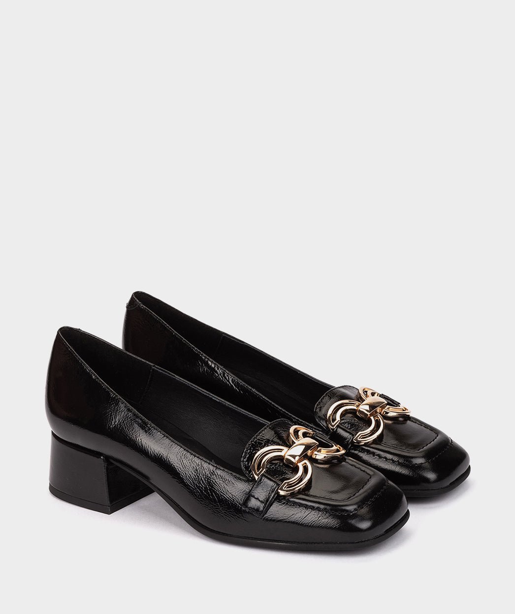 Black high heel shoes with metallic ornament. PEDRO MIRALLES Black