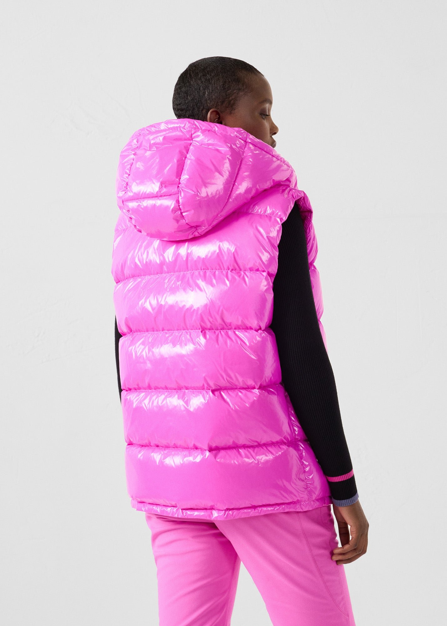 Padded sleeveless down jacket for extreme cold weather. JOTT Pink