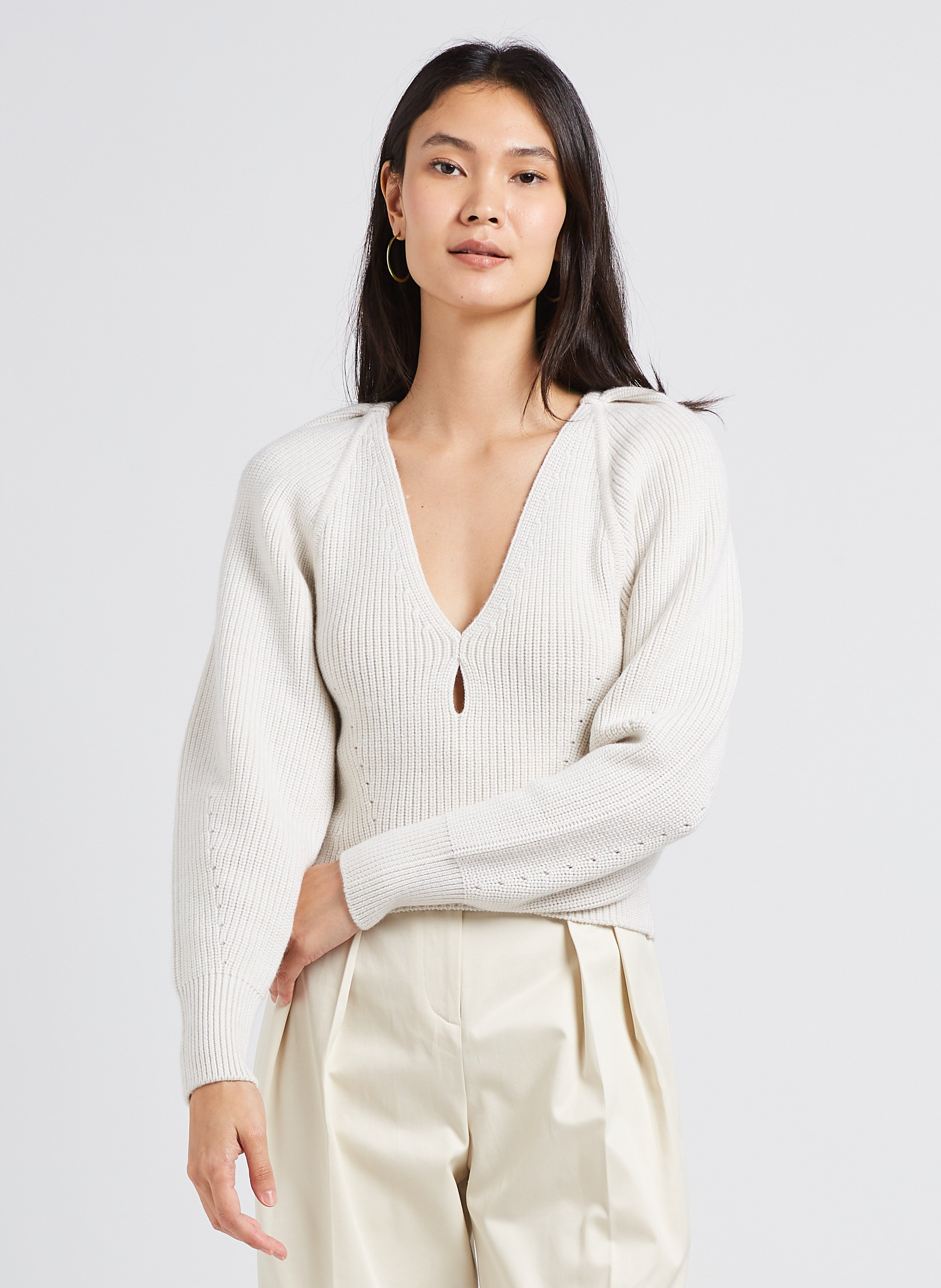 Beige V neck low cut wool sweater