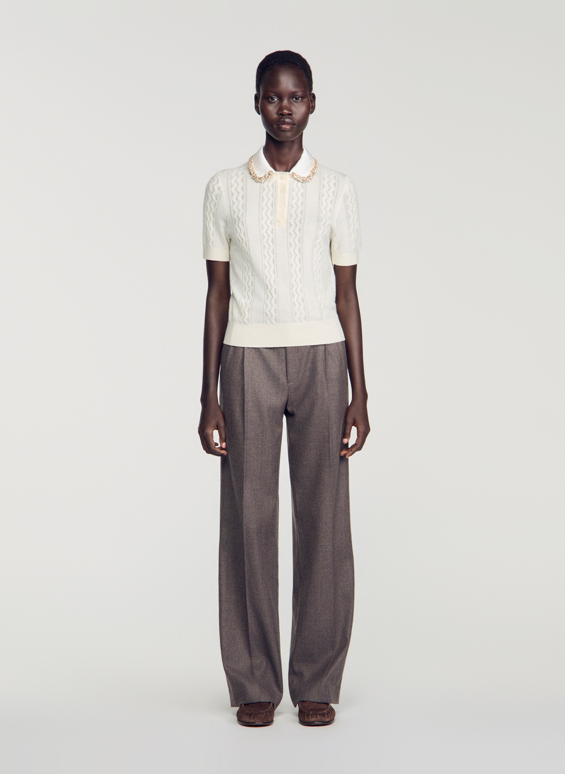 Nauwsluitende polo van wol SANDRO Beige