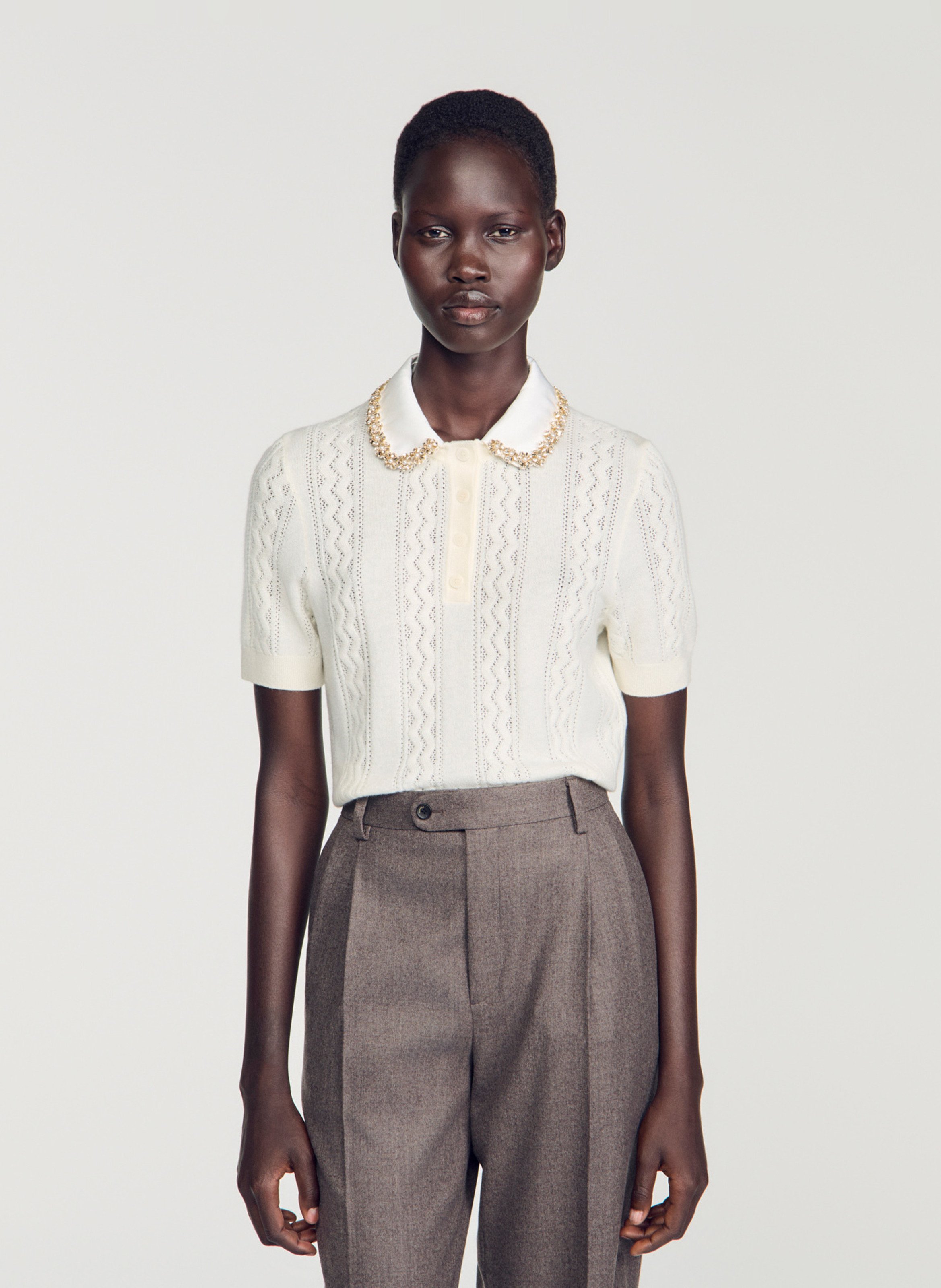 Nauwsluitende polo van wol SANDRO Beige