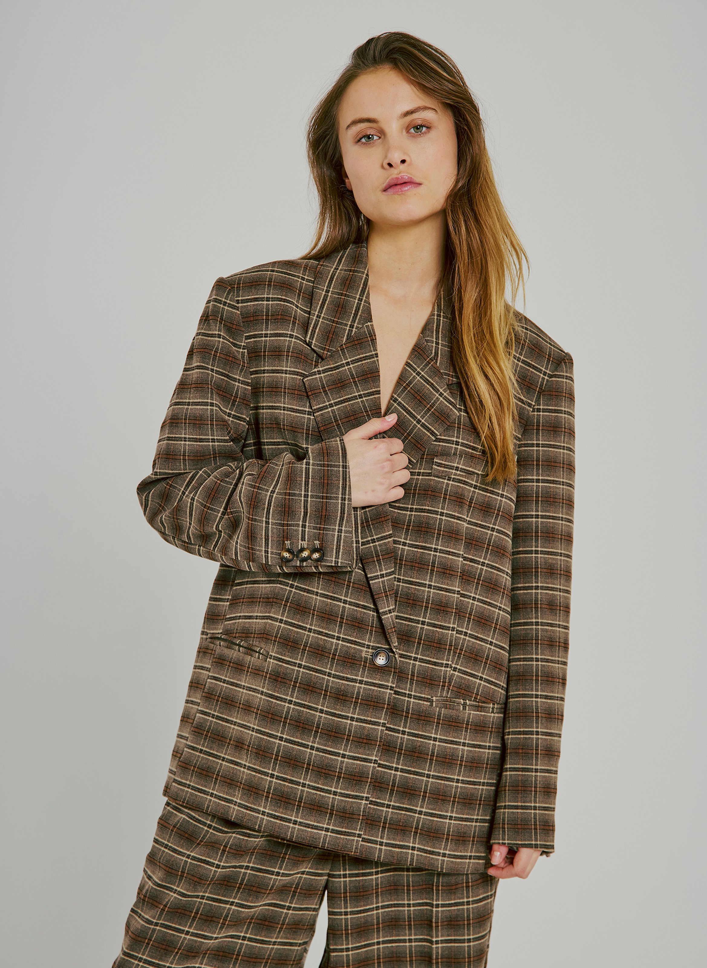 Oversized blazer jacket with a checked lapel. NORR Brown