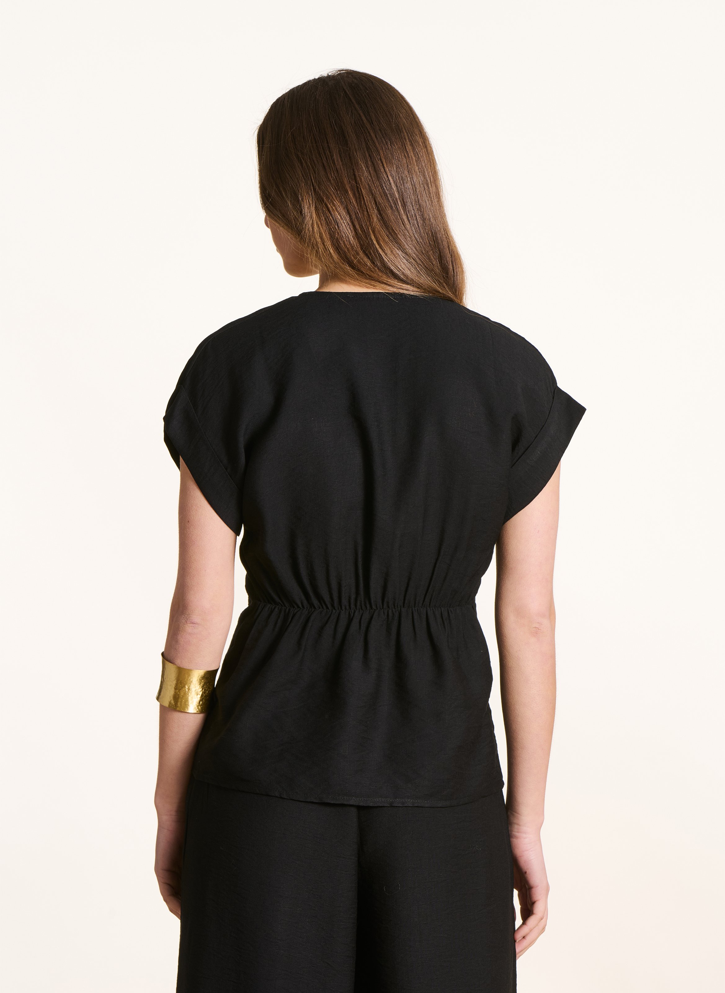 Nauwsluitende top met V-hals Zwart