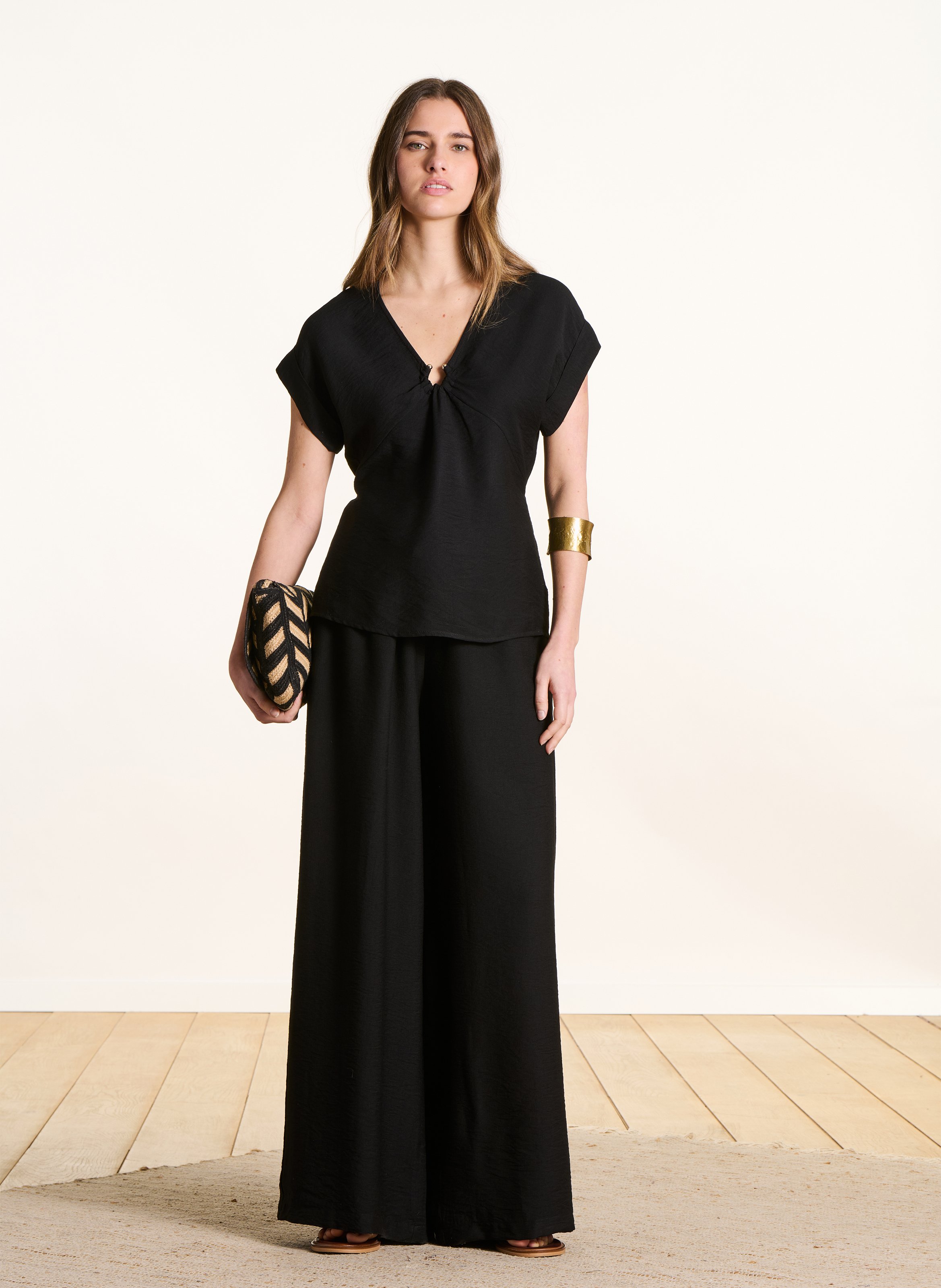 Nauwsluitende top met V-hals Zwart