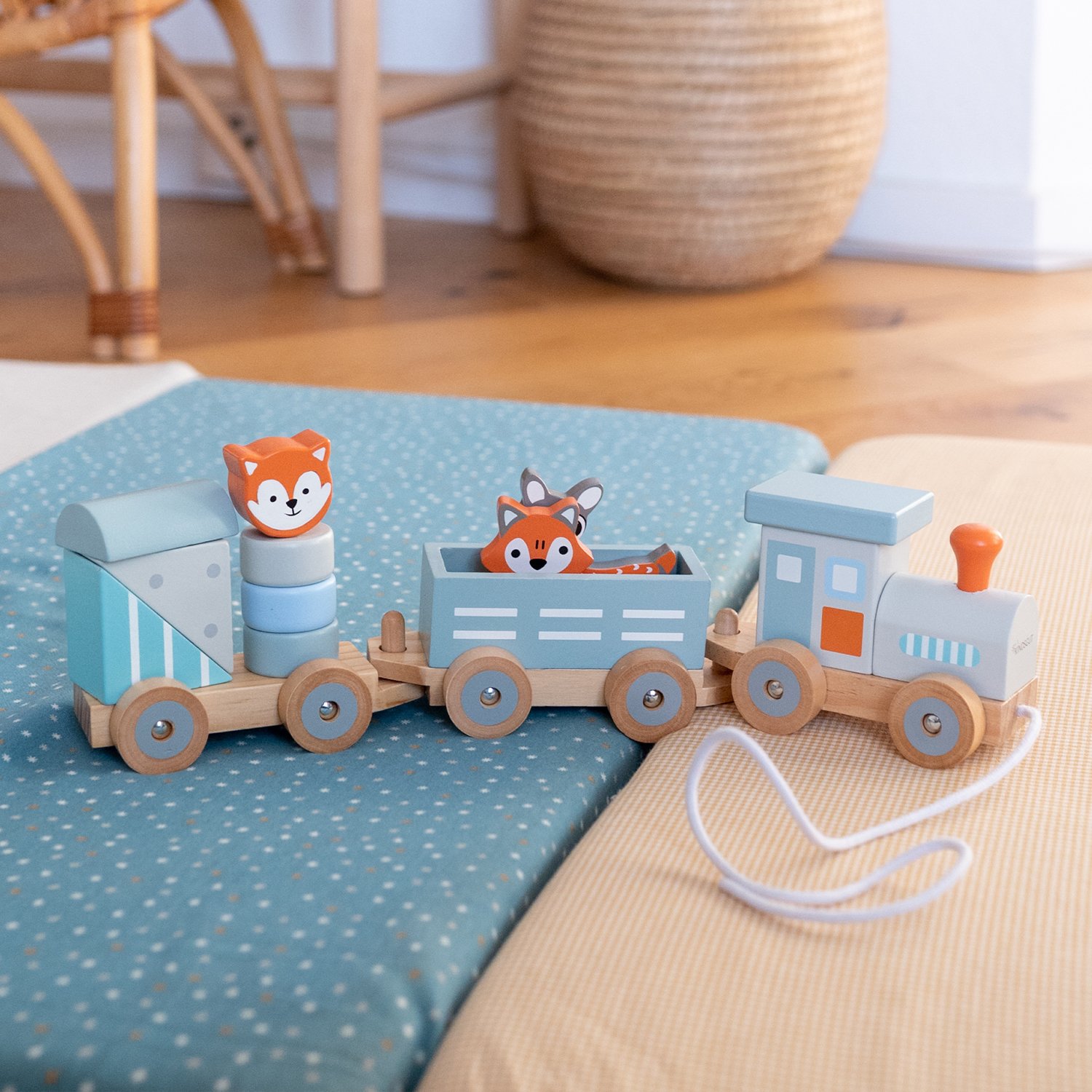 Small wooden zoo animal train with star pattern KINDSGUT Blue