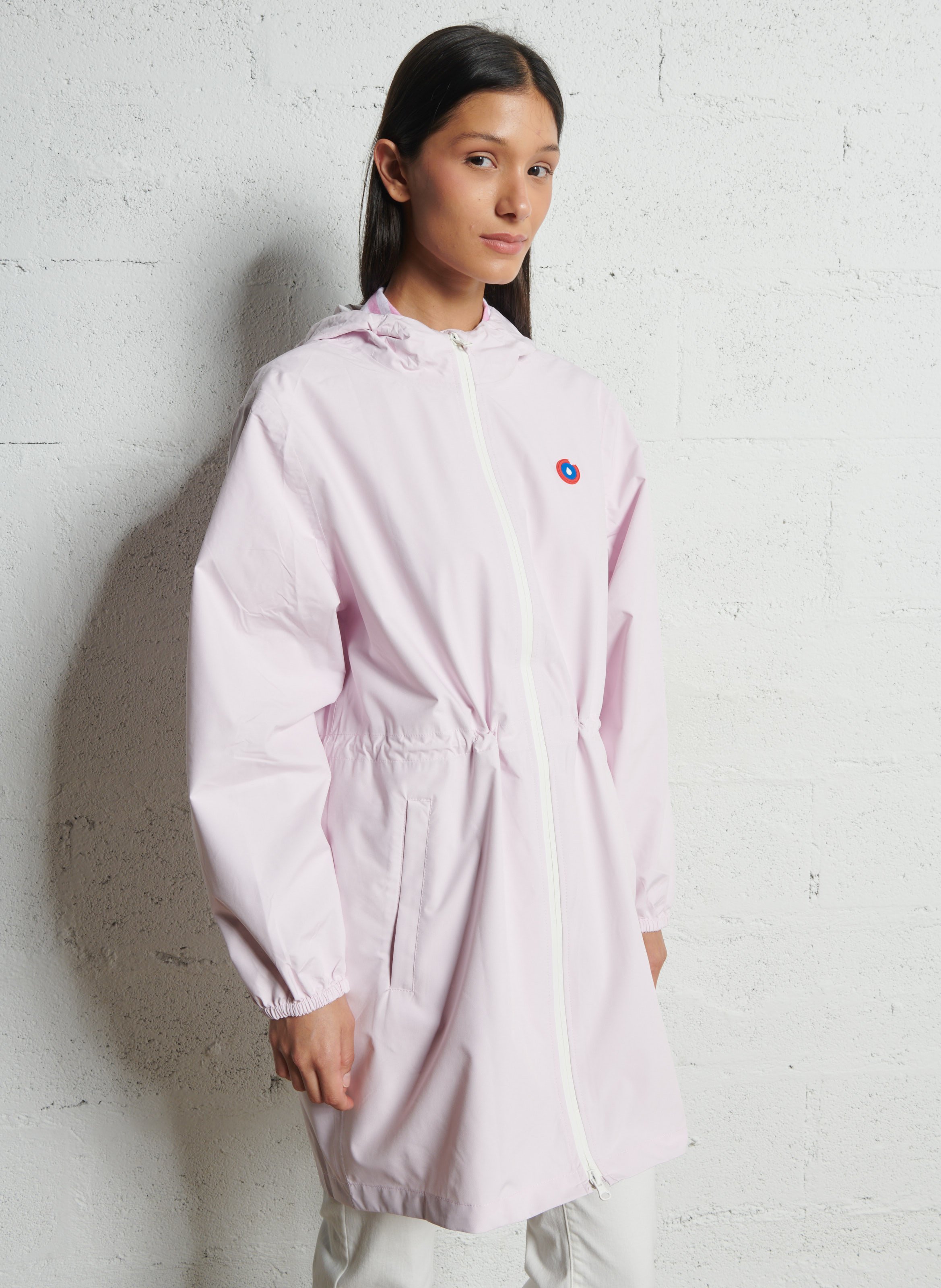 Lange regenjas met capuchon, om te vormen tot rugzakje FLOTTE Roze