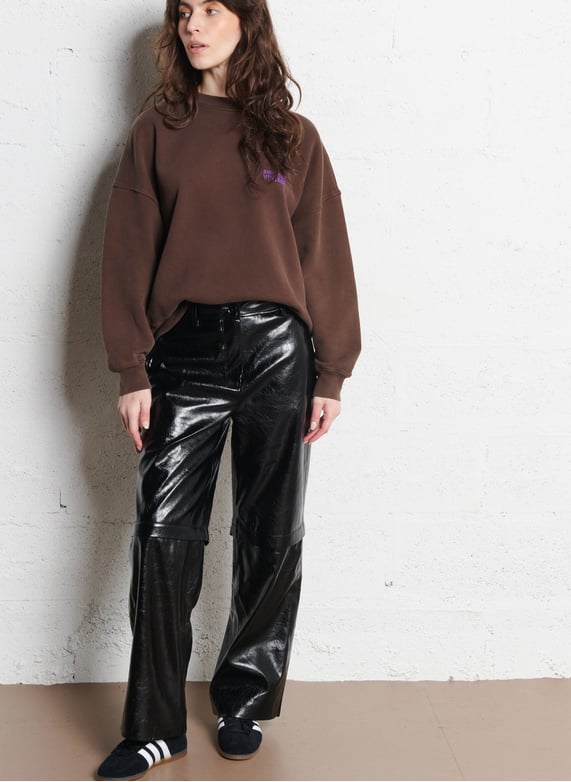 Wijde broek van imitatieleer | Zwart by BERENICE Wijde broek van imitatieleer Zwart