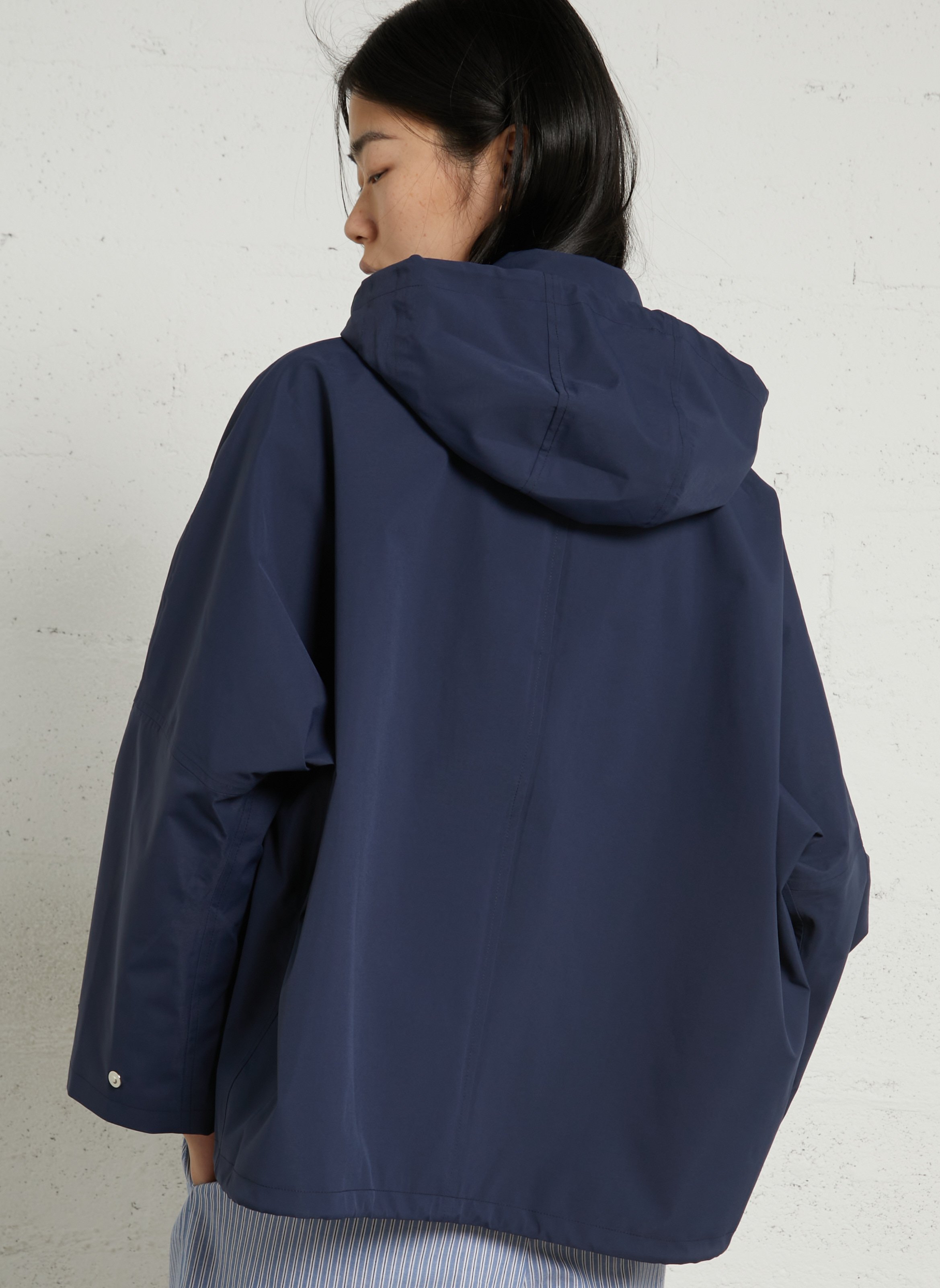 Buttoned and zipped high-neck fitted raincoat FLOTTE Blue