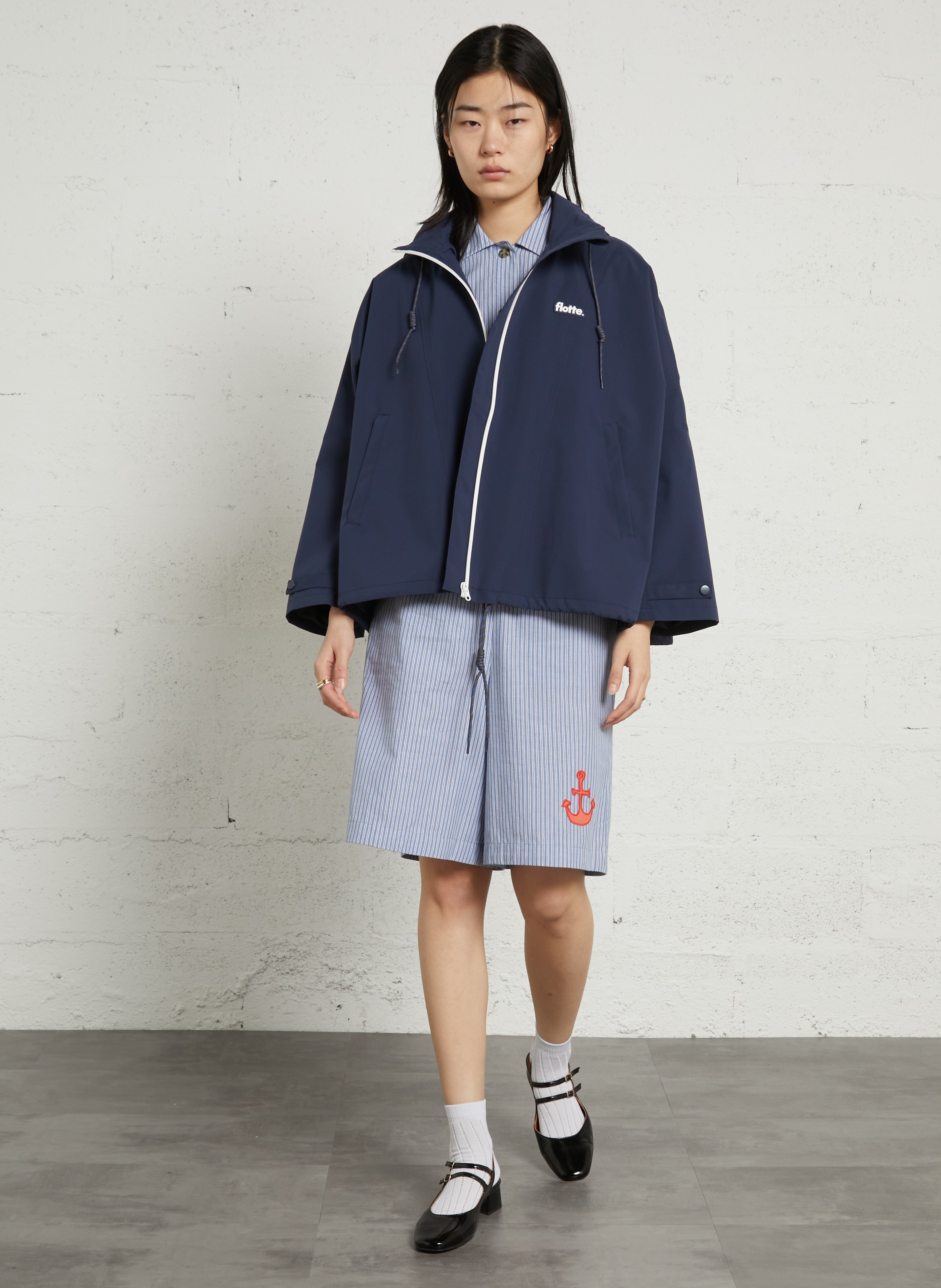 Buttoned and zipped high-neck fitted raincoat FLOTTE Blue