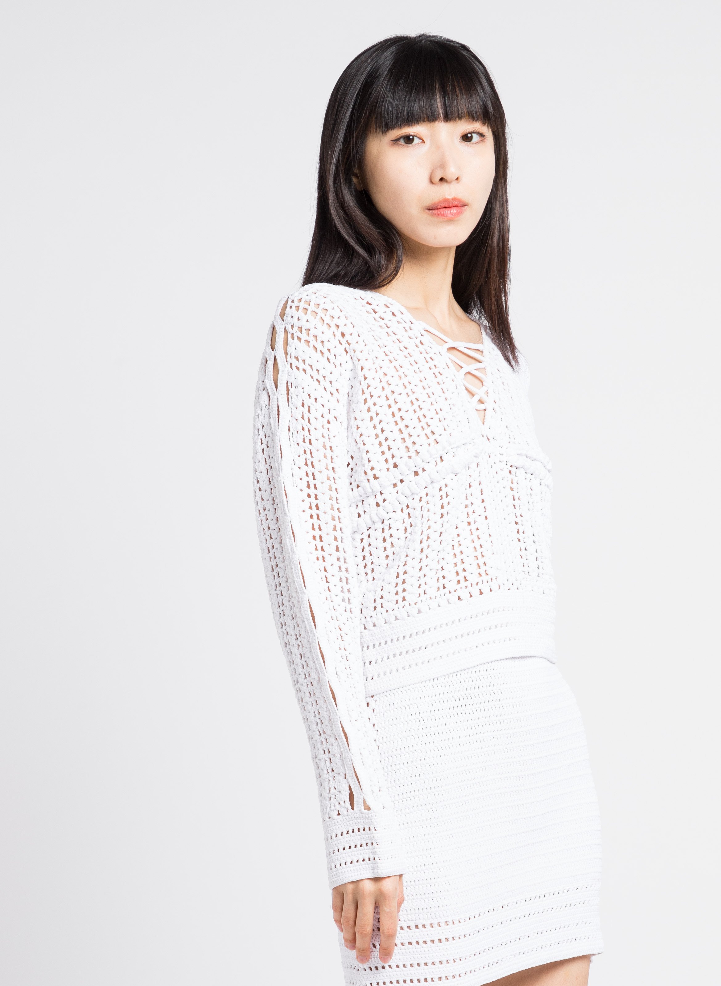 Pullover dritto scollo a V  lavorato all’uncinetto Bianco