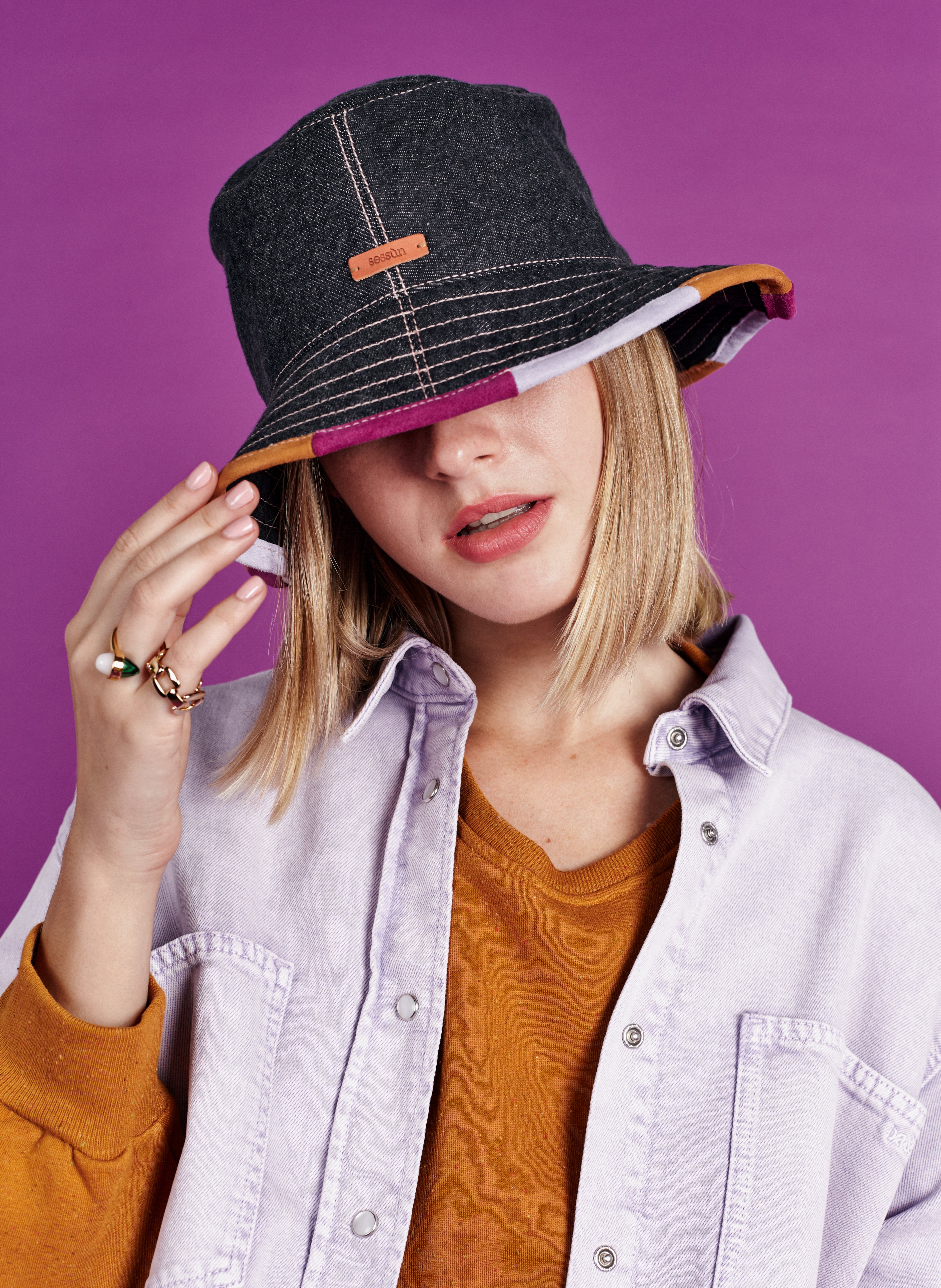 Girl wearing cheap bucket hat