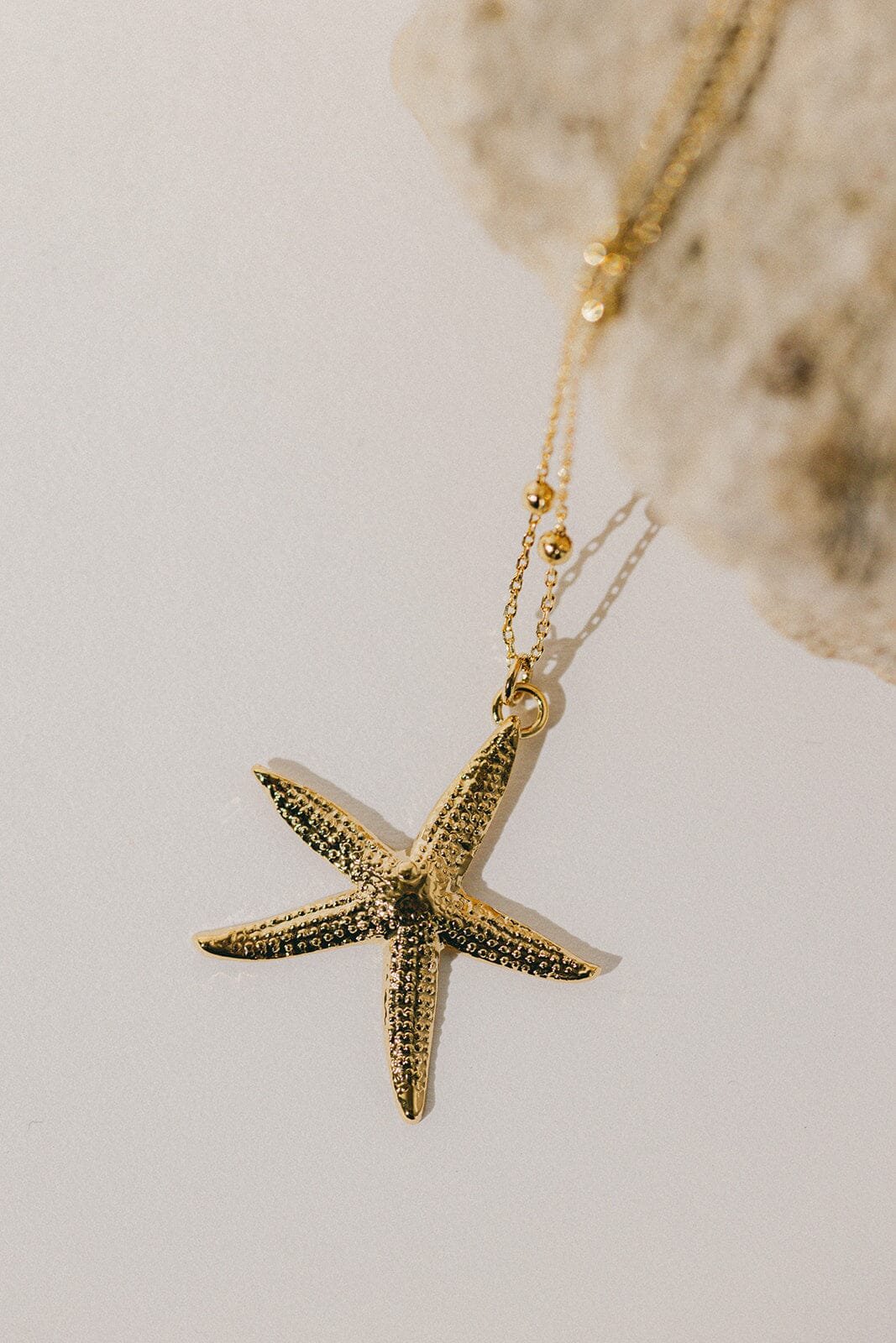 Golden star pendant necklace in gold-plated silver Golden