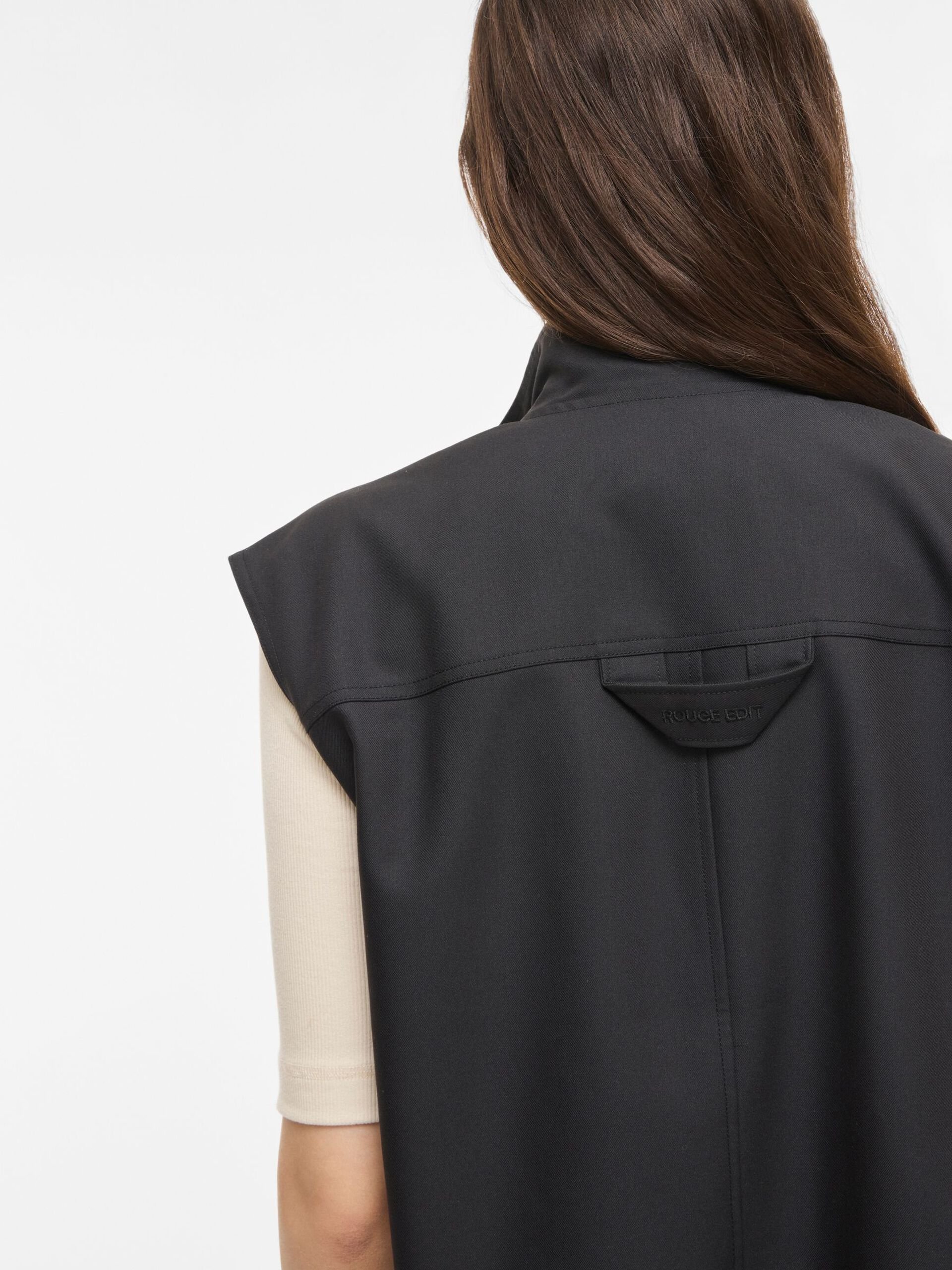Wijdvallend mouwloos vest in effen kleur. ROUGE EDIT Grijs