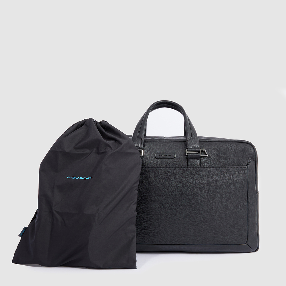 Leather travel bag with shoe compartment and trolley strap. Black