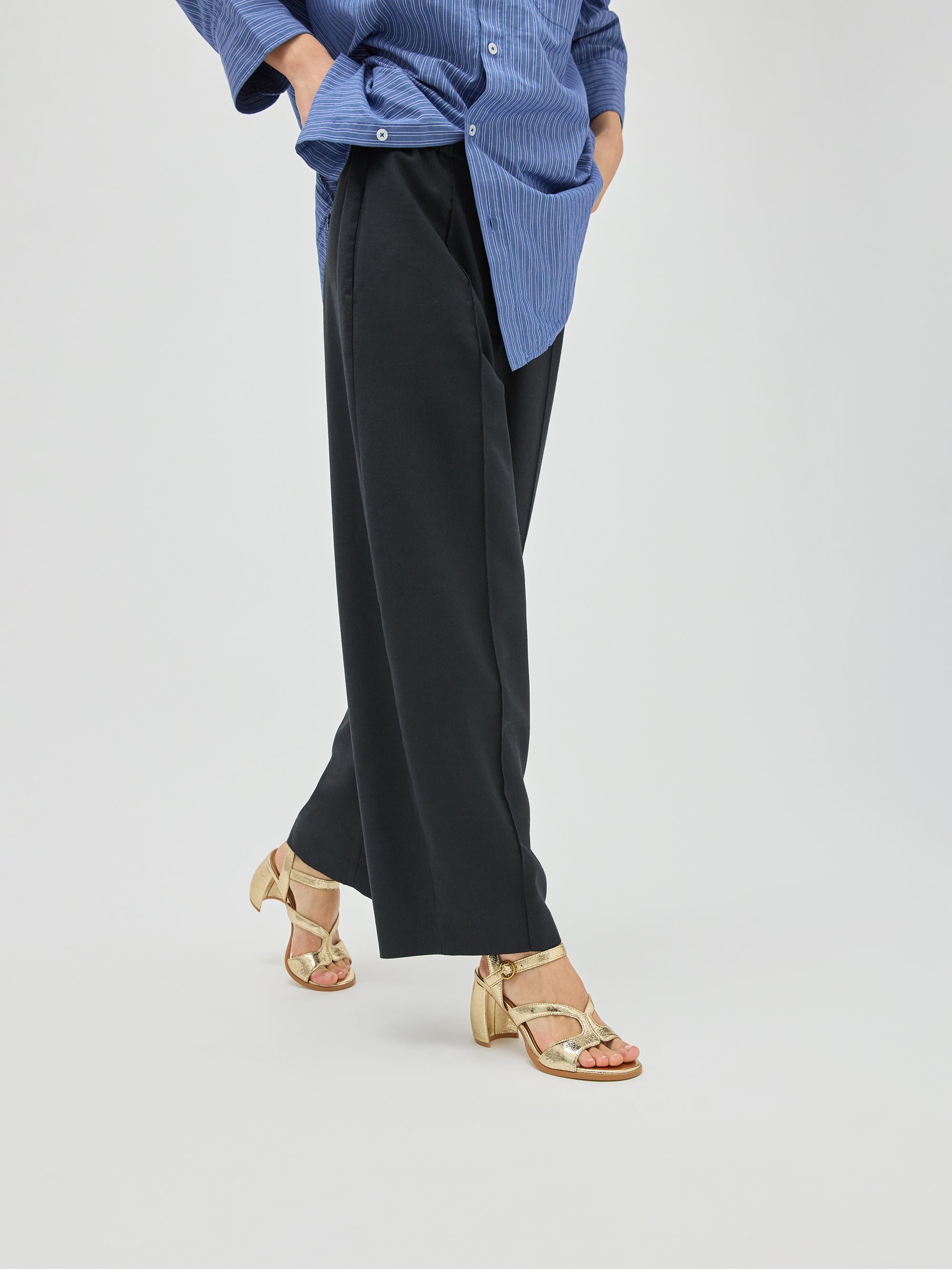 Leather sandals with ankle strap and demi-lune heel. VANESSA WU Golden