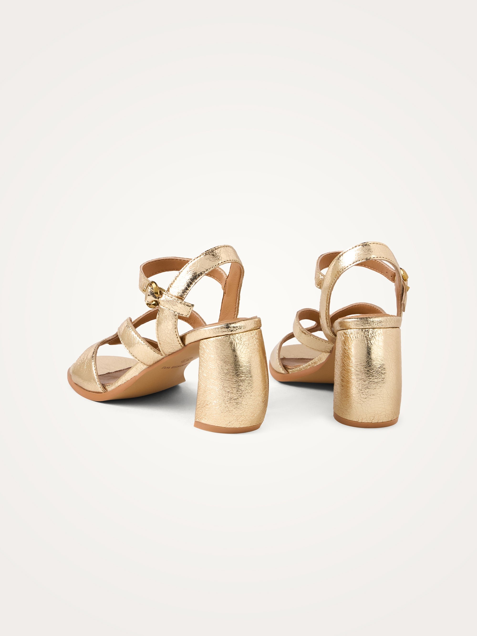 Leather sandals with ankle strap and demi-lune heel. VANESSA WU Golden