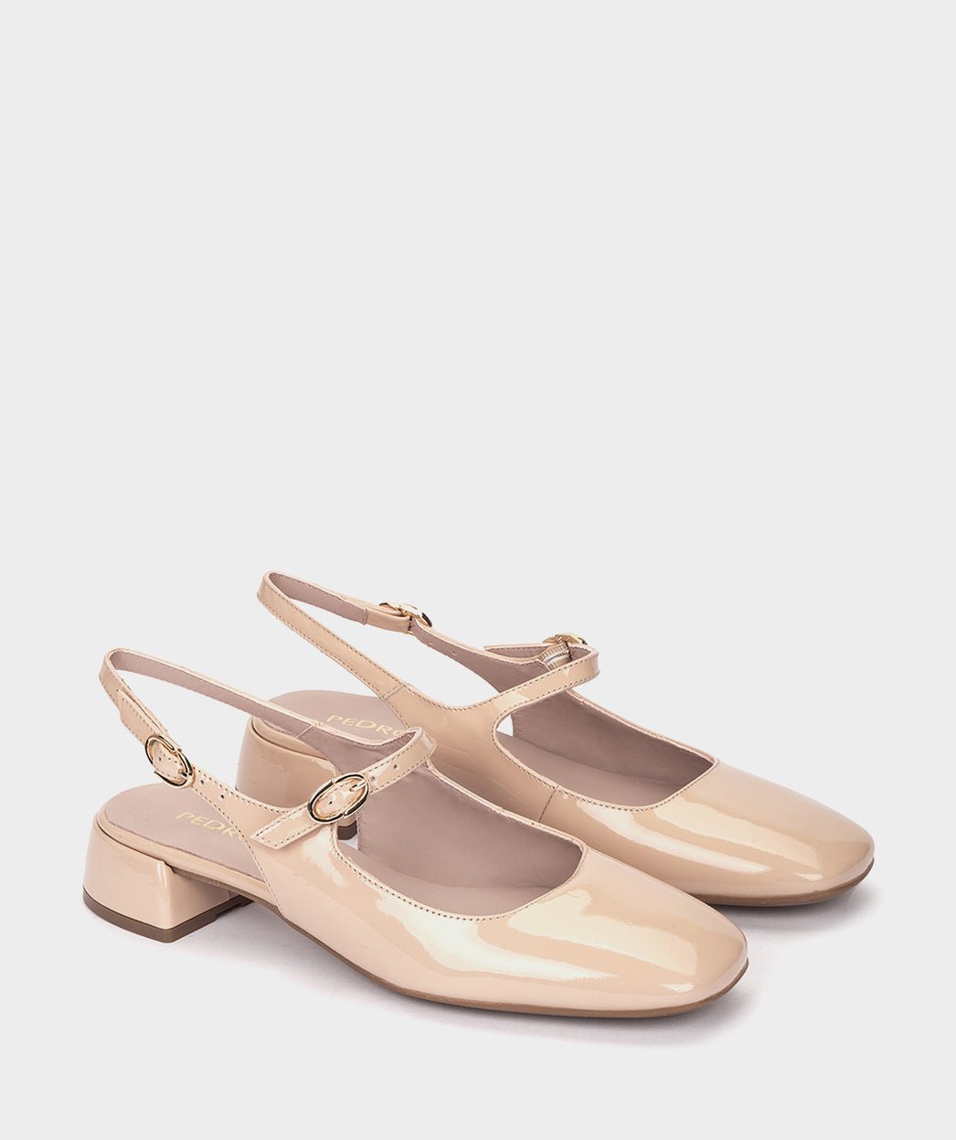 <p>Pumps in patent leather, nude color.</p> PEDRO MIRALLES Beige