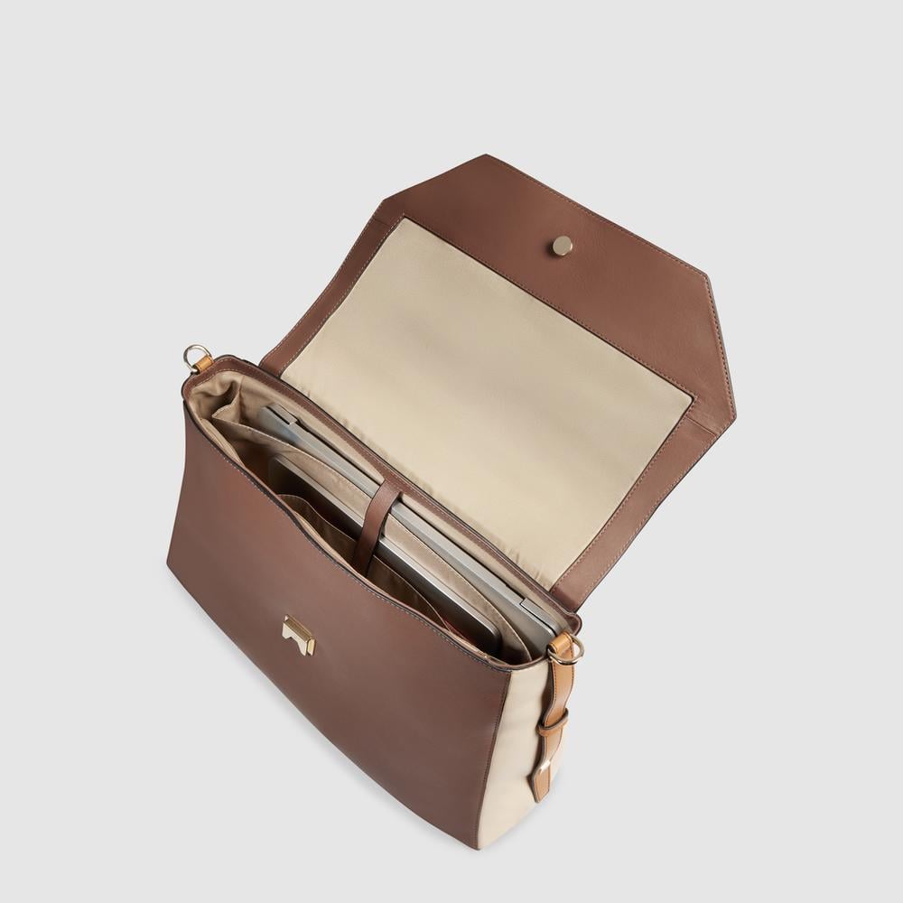 Women's leather satchel bag with laptop compartment, shockproof protection, and RFID shielding PIQUADRO Brown
