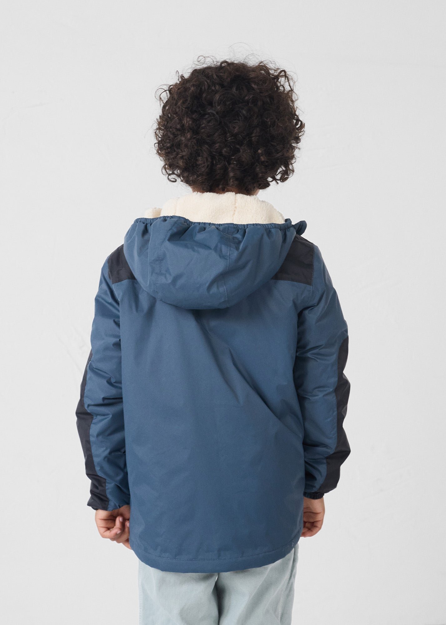 Children's hooded sherpa-lined raincoat in bluestone lag sherpa JOTT Blue