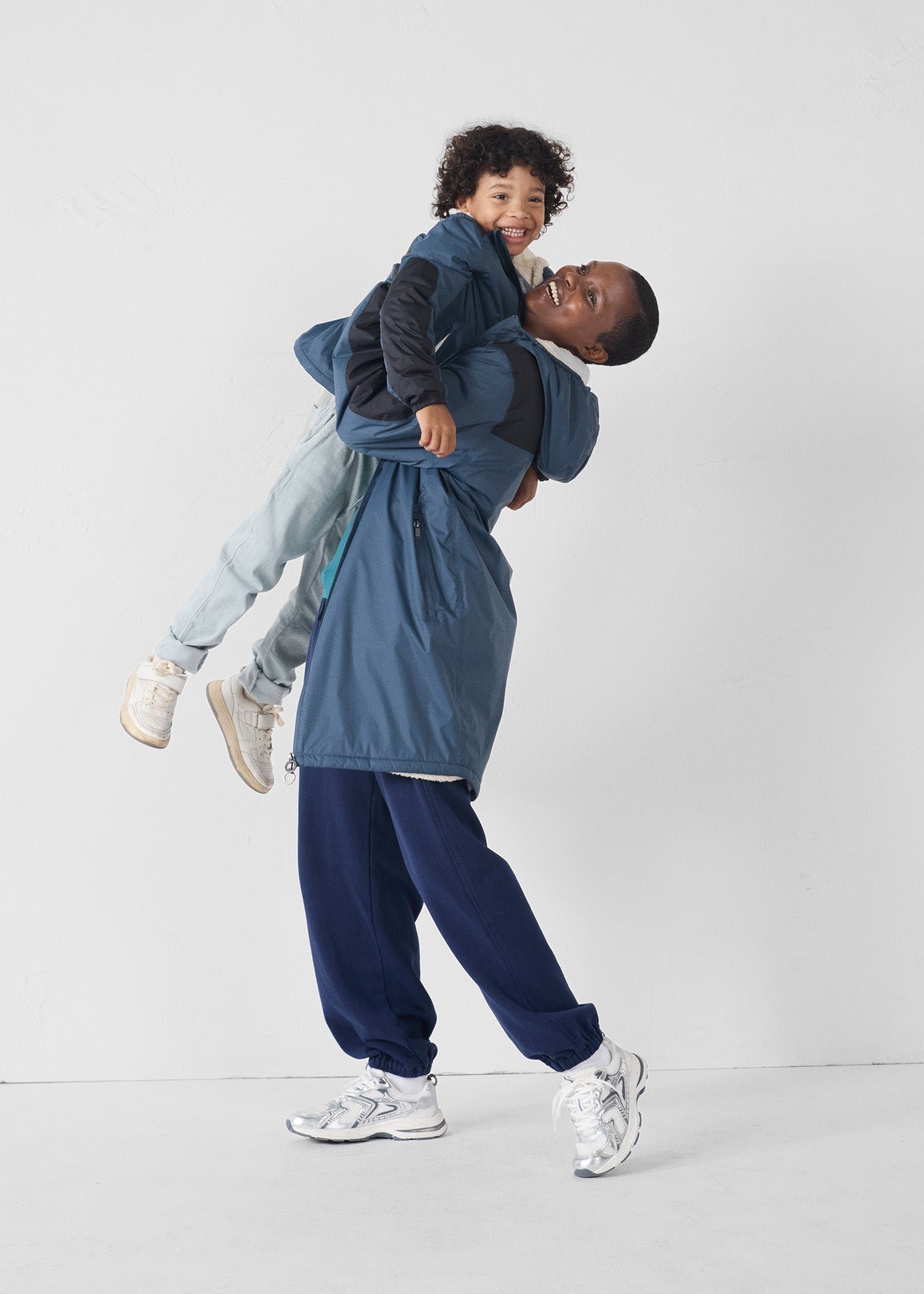 Children's hooded sherpa-lined raincoat in bluestone lag sherpa JOTT Blue