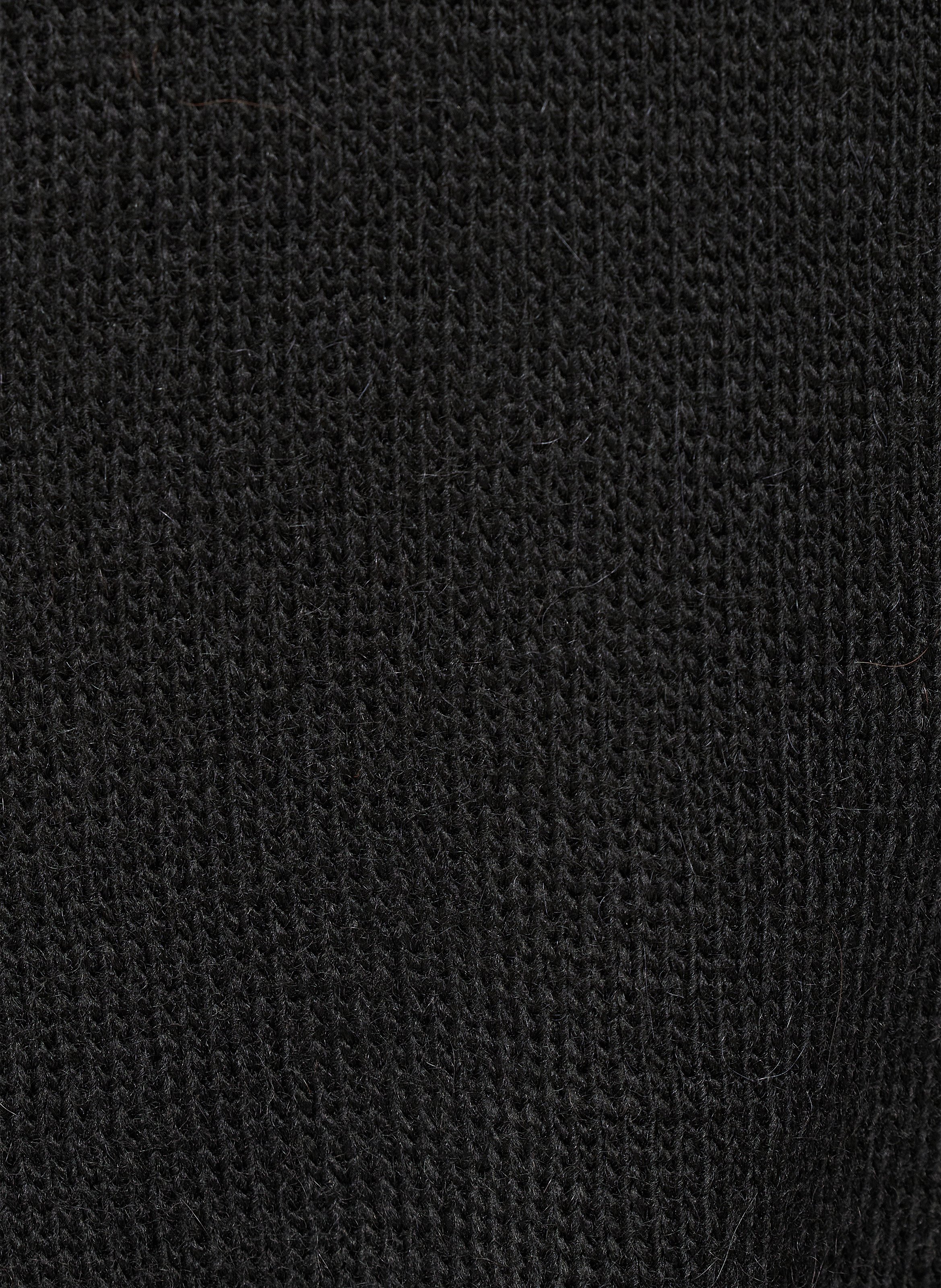 Suéter holgado liso con bolsillos. HUMILITY Negro