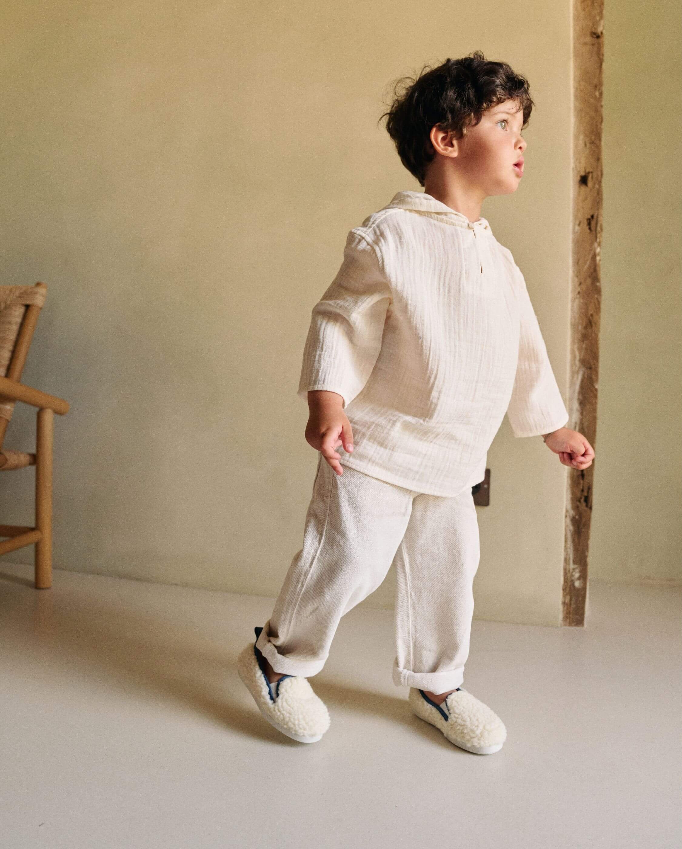 Child slipper in white wool bouclé. ANGARDE White