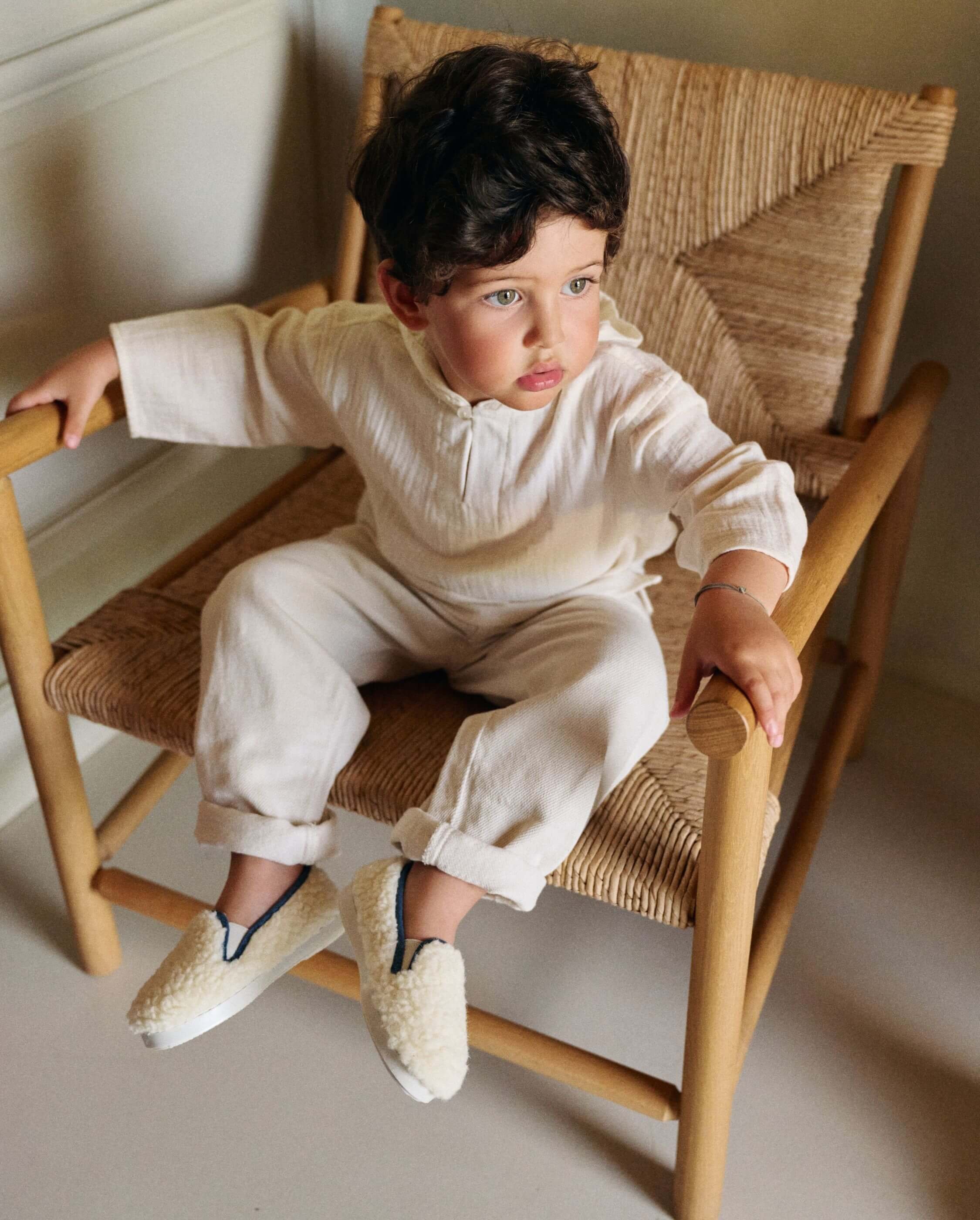 Child slipper in white wool bouclé. ANGARDE White