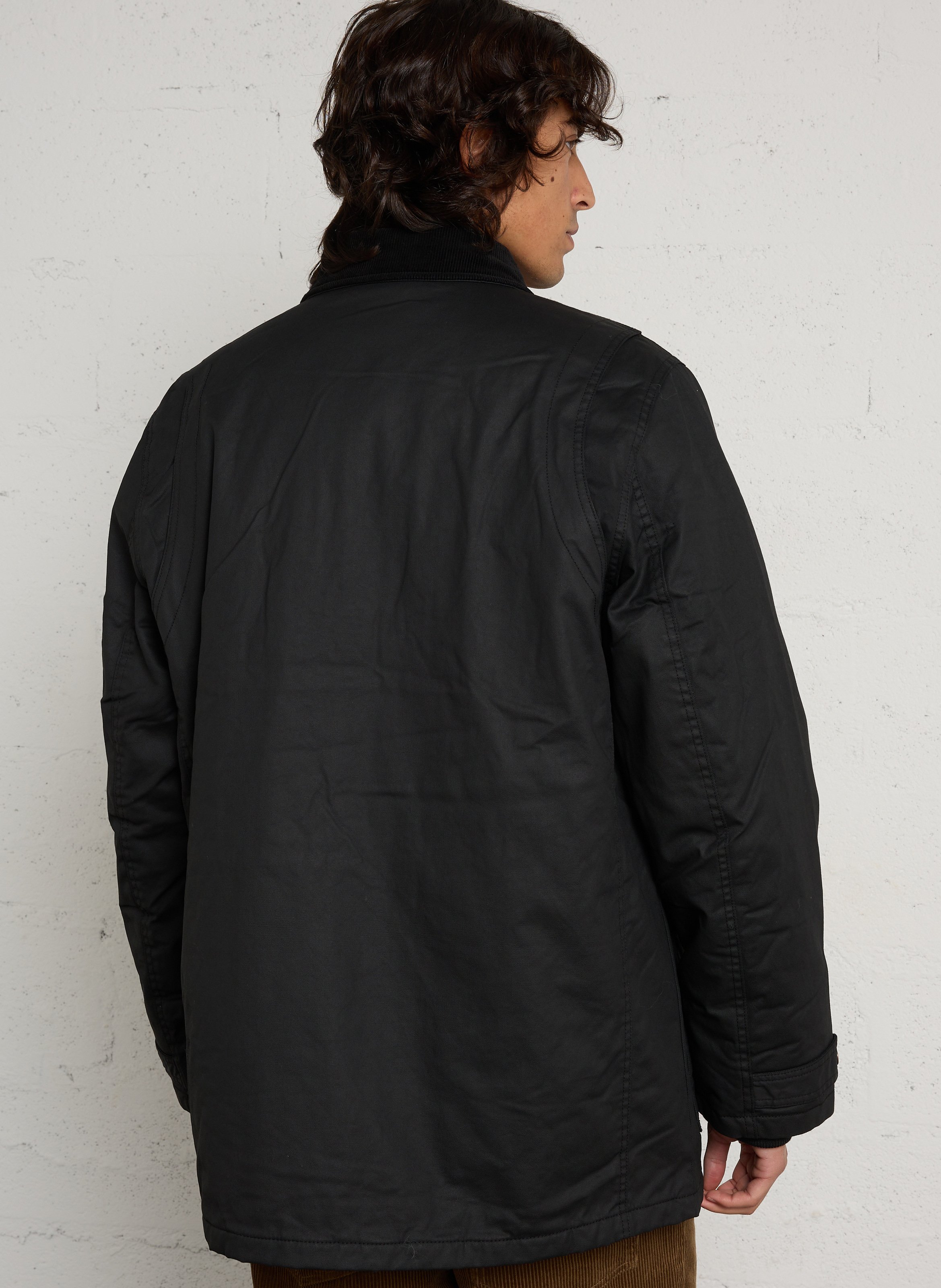 Pull col polo boutonné droit en laine mélangée MINIMUM Noir