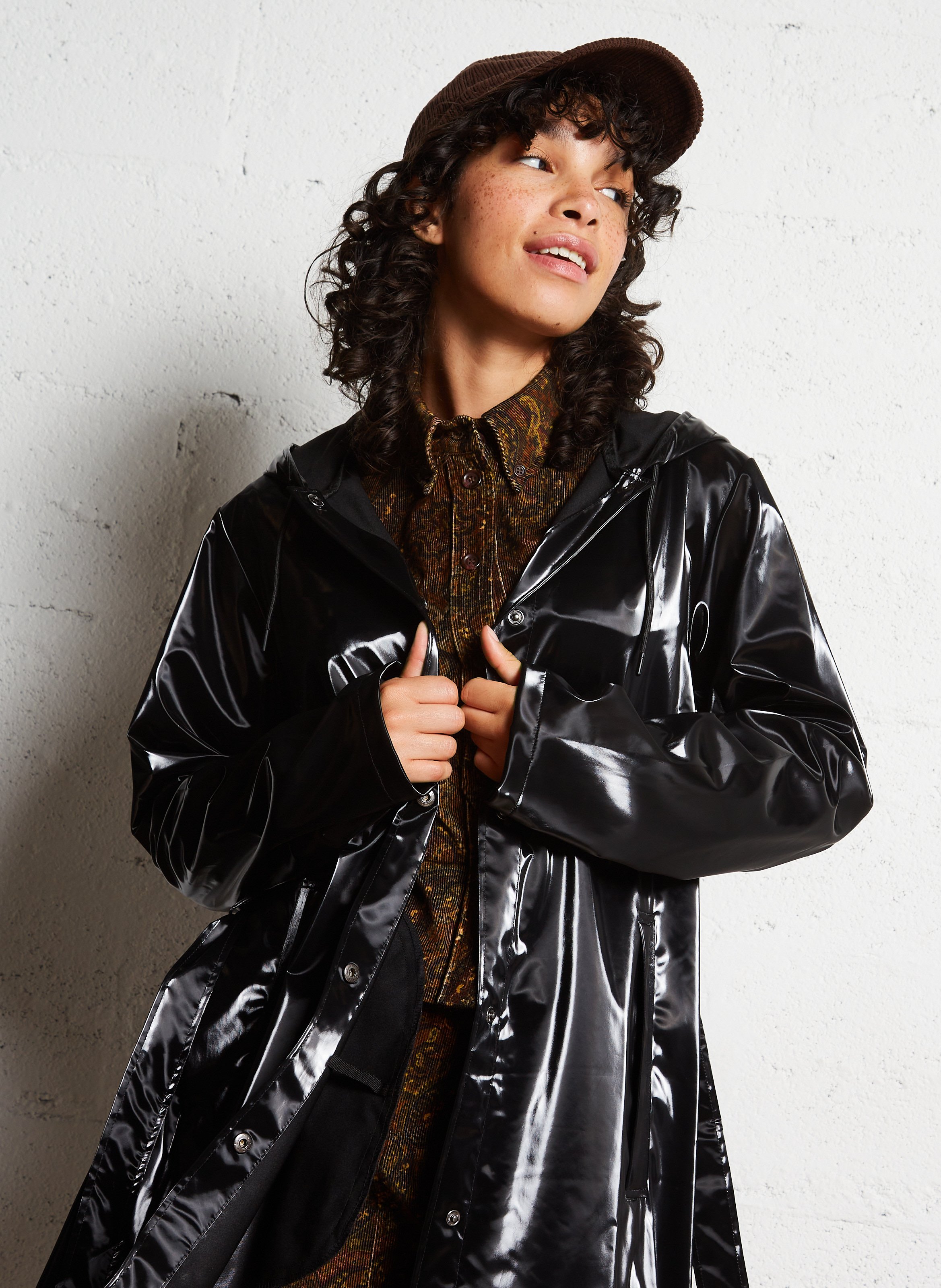 Rains black raincoat best sale