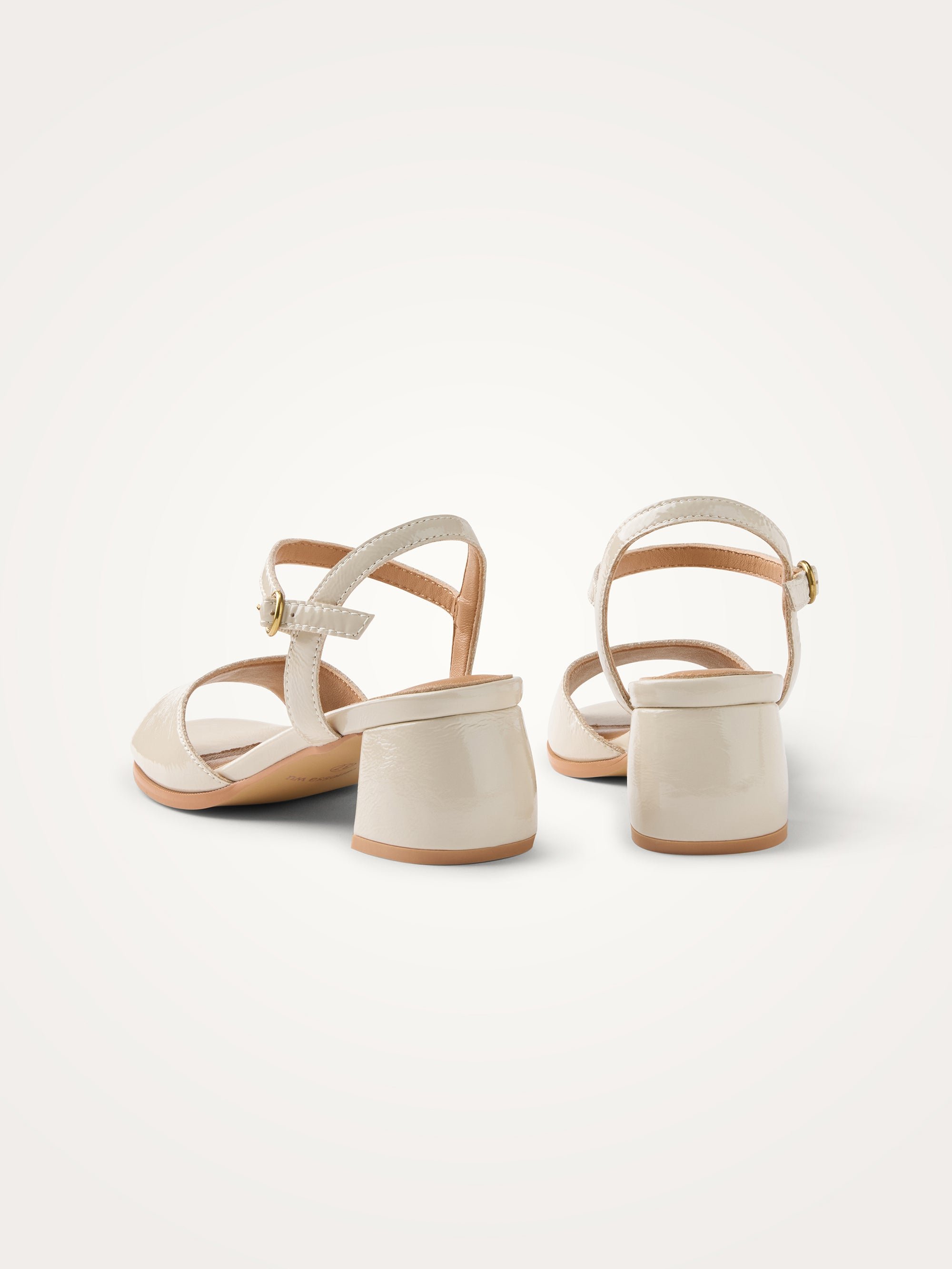Sandals in aged effect patent leather with demi-lune heel Beige