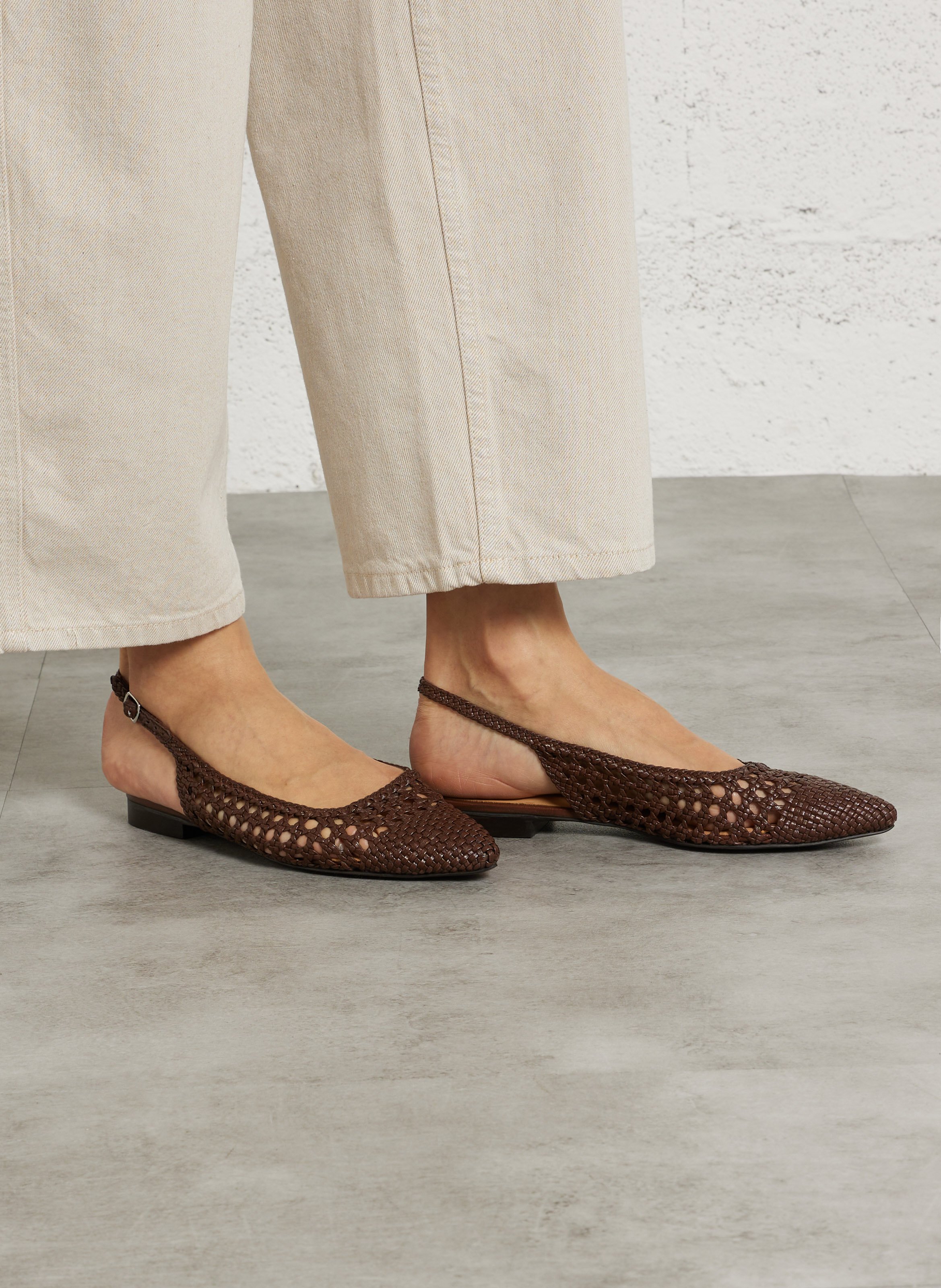 Ballerina's met slingback van gevlochten leer. Bruin