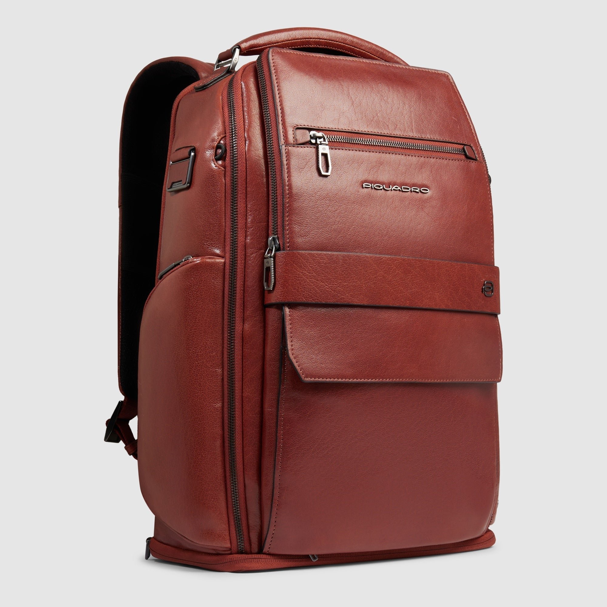 Travel backpack with USB and USB Type-C ports PIQUADRO Orange