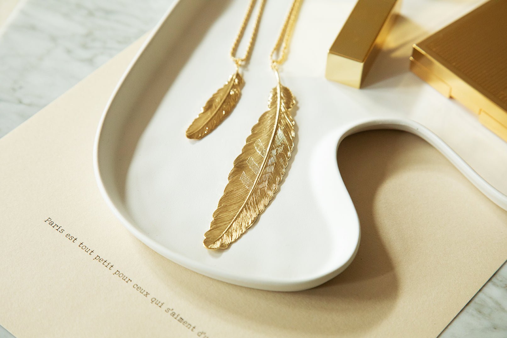 Silver plated feather necklace Golden