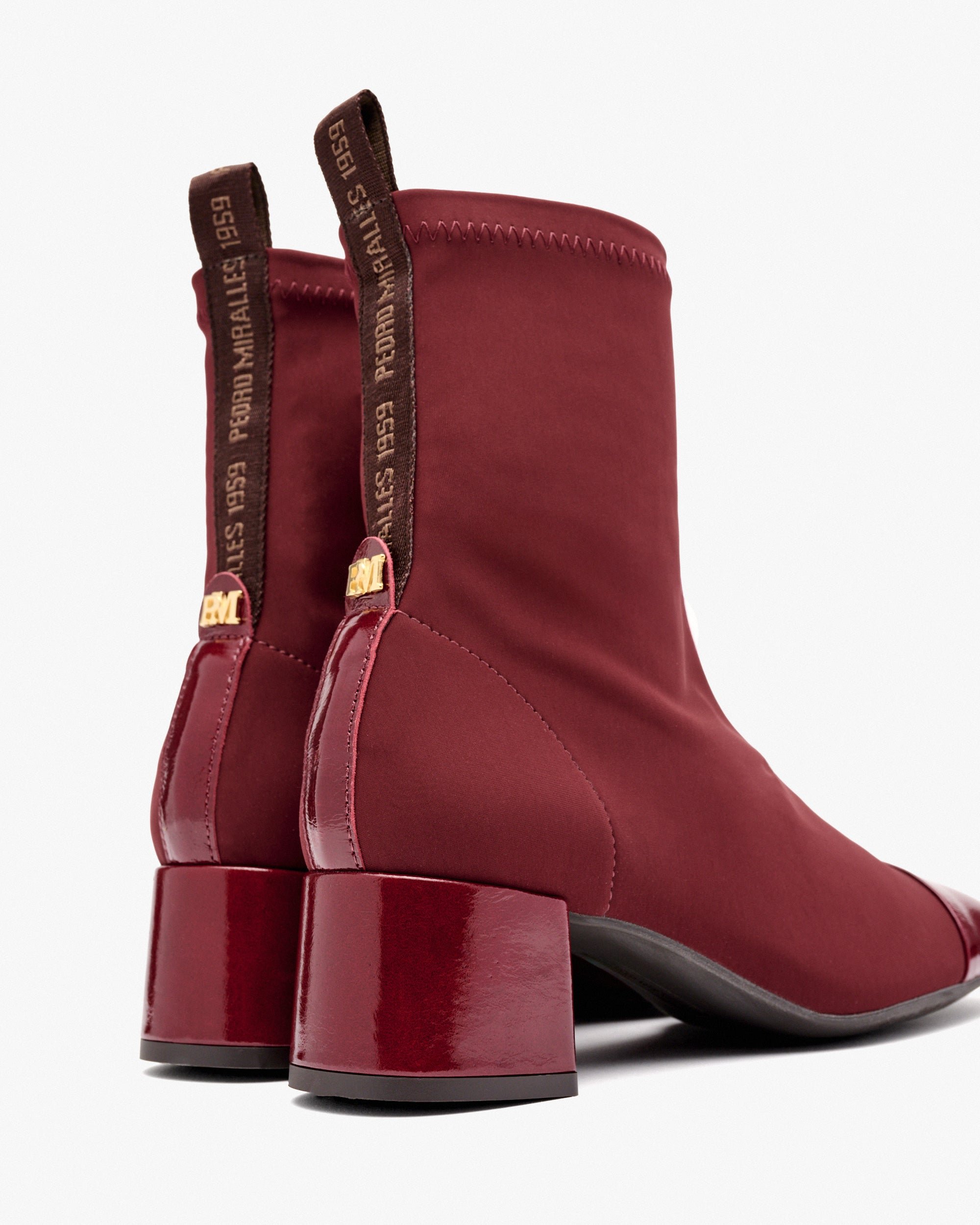 Ankle boots with high heels in burgundy stretch fabric. PEDRO MIRALLES Red