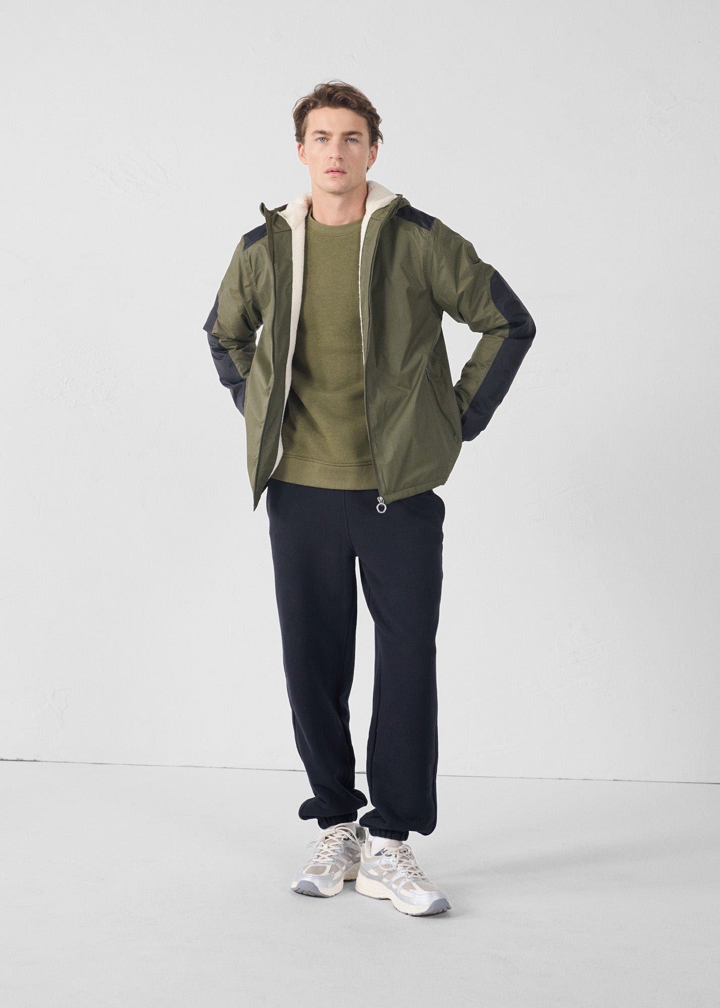Sherpa-lined waterproof coat. JOTT Green