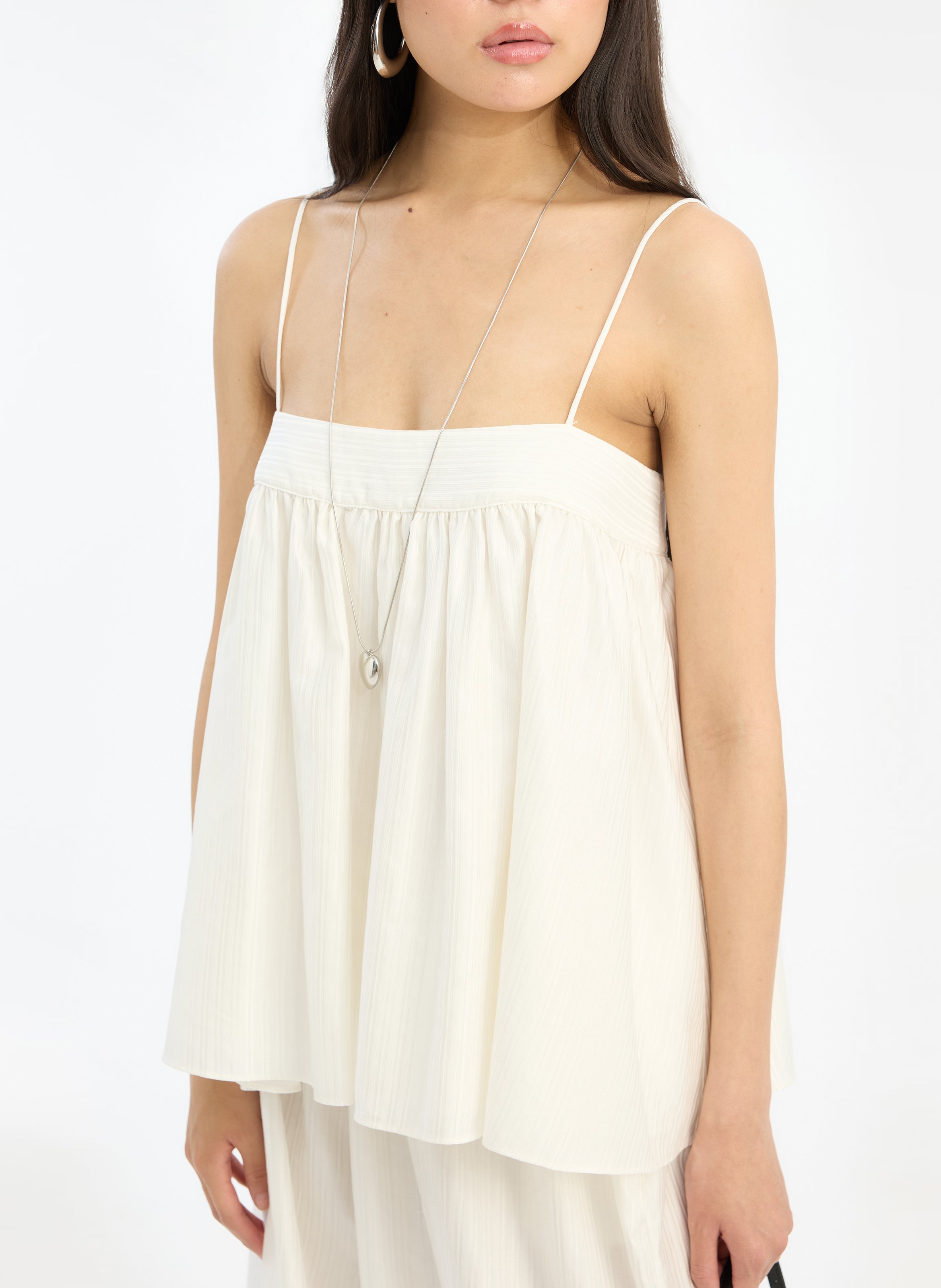 Pantalon élastiqué ample rayé ROTATE Blanc