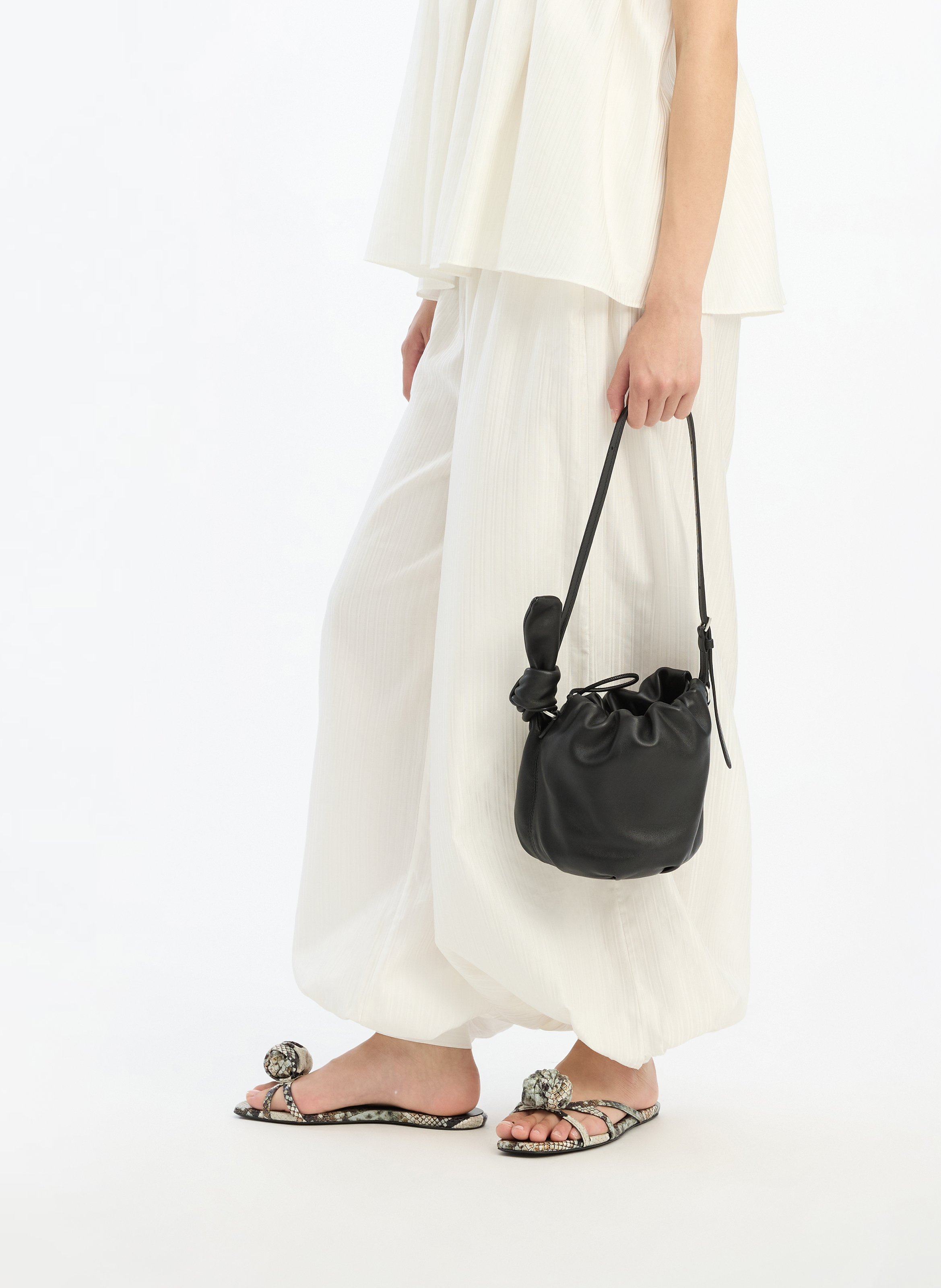 Pantalon élastiqué ample rayé ROTATE Blanc