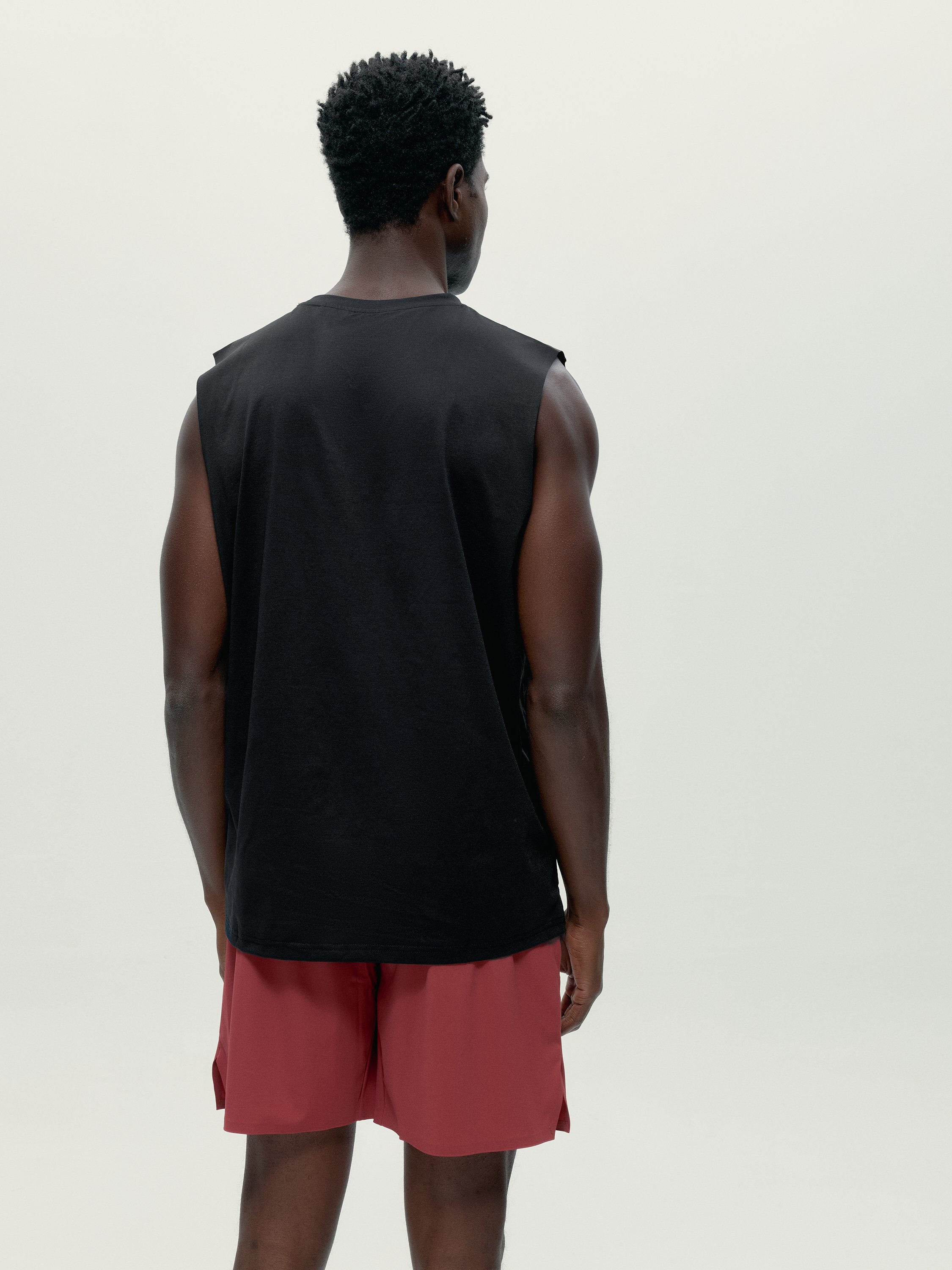 Men's sleeveless sports t-shirt by Daxon. BORN Black