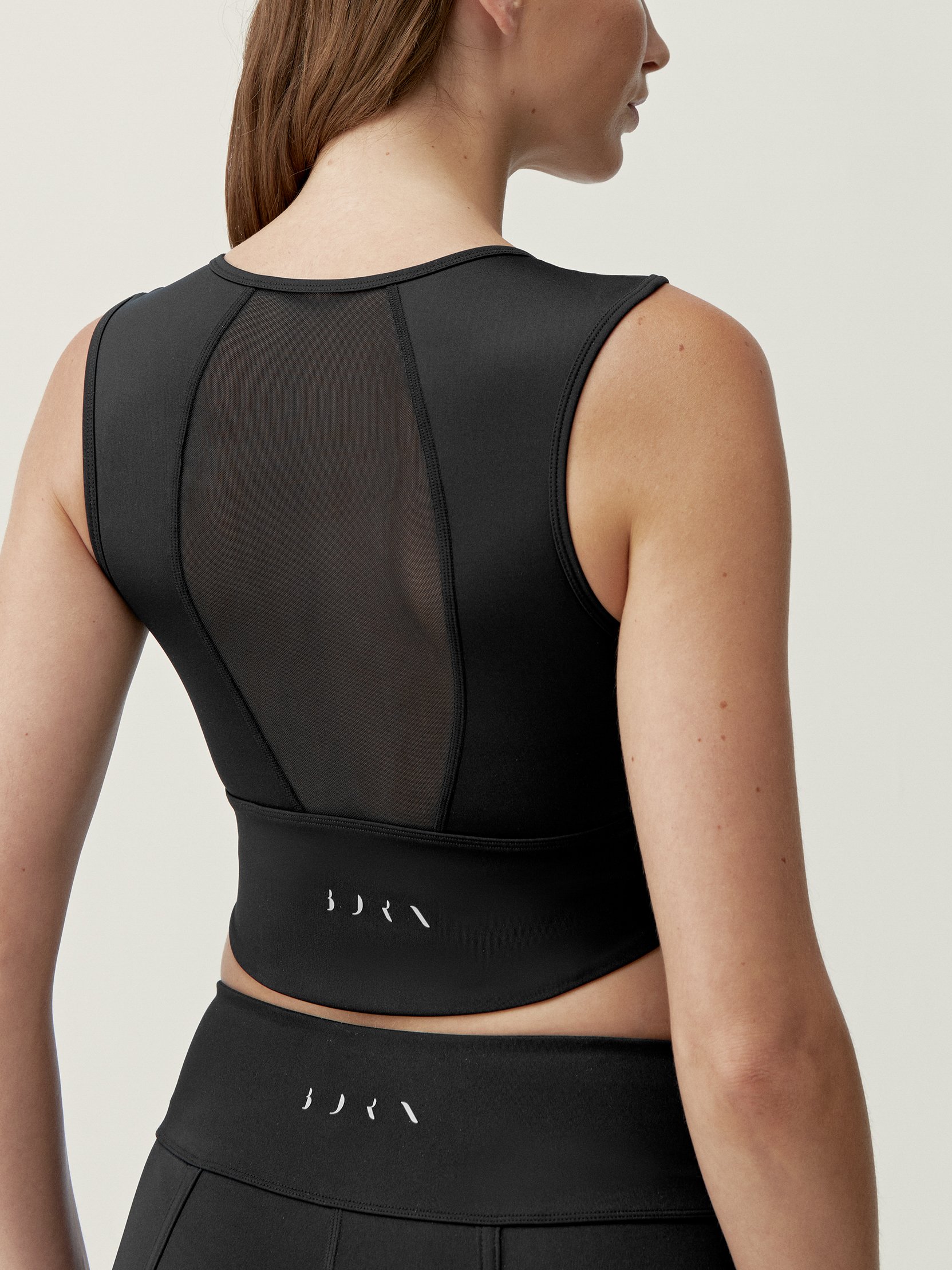 Medium support performance sports bra by ALISHA BORN LIVING YOGA Black