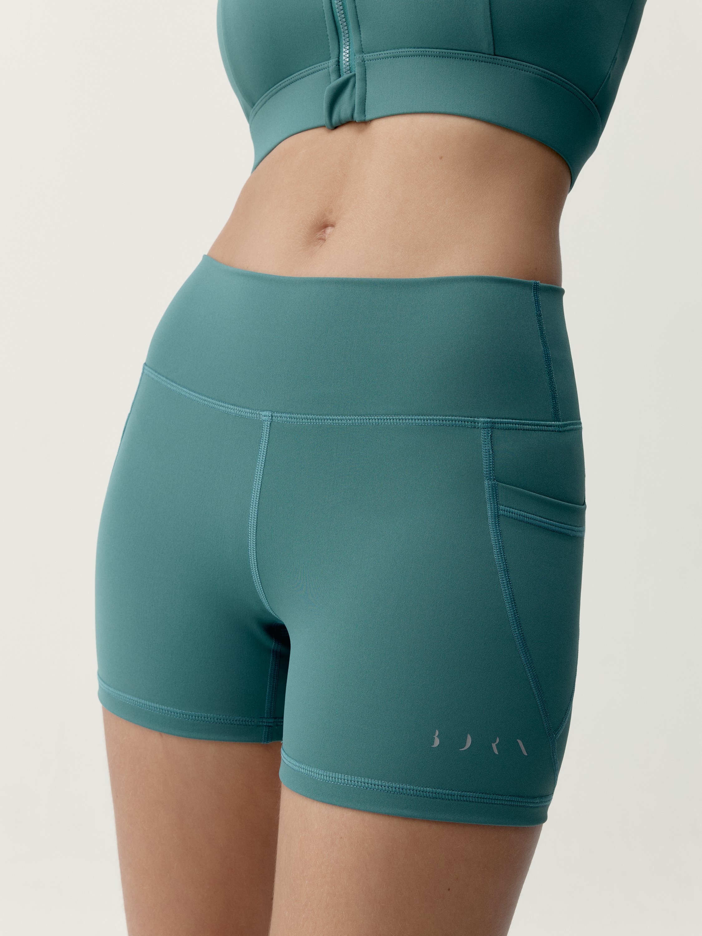Short moulant de sport performance eider BORN Bleu