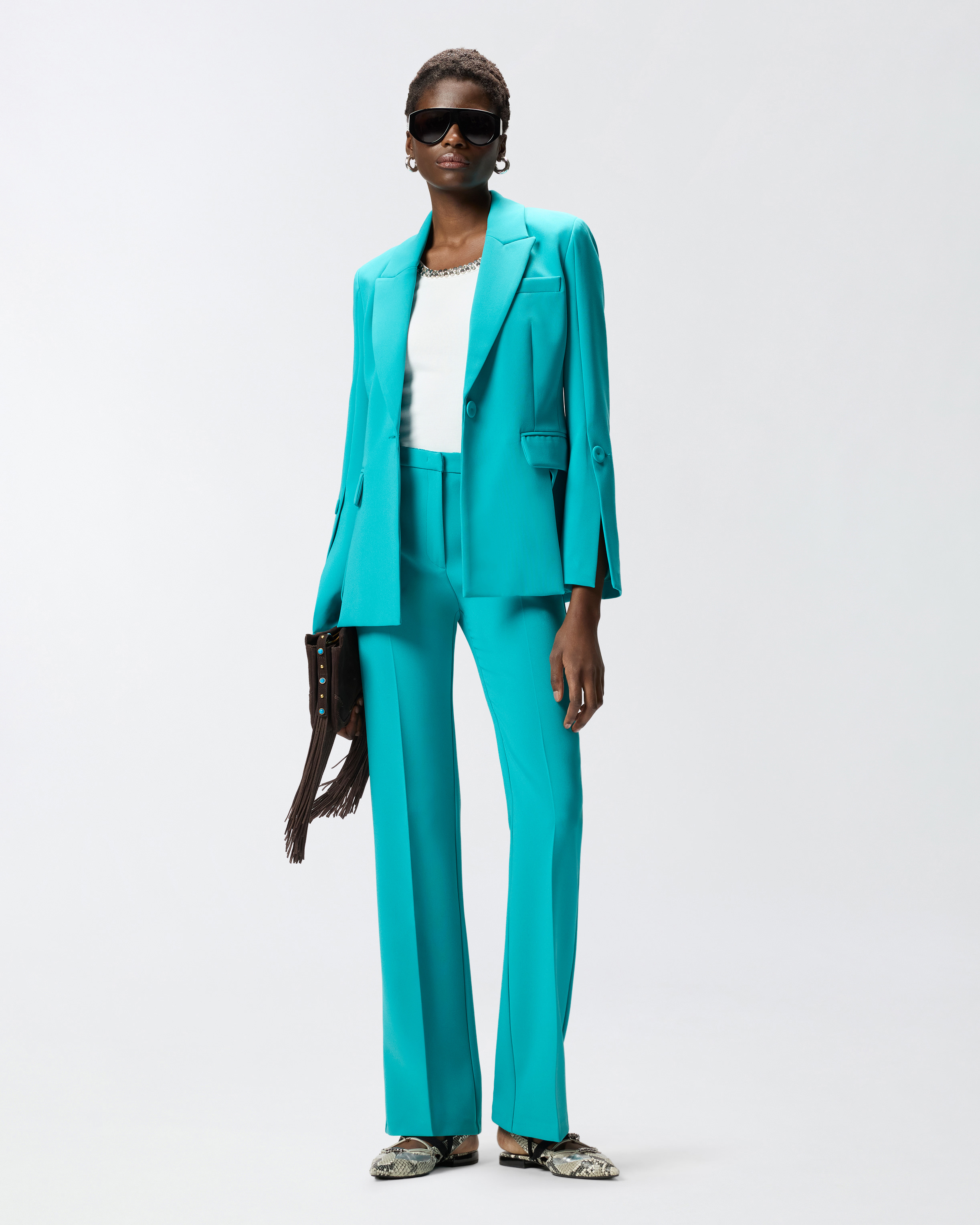 Trousers with prominent pleats Green