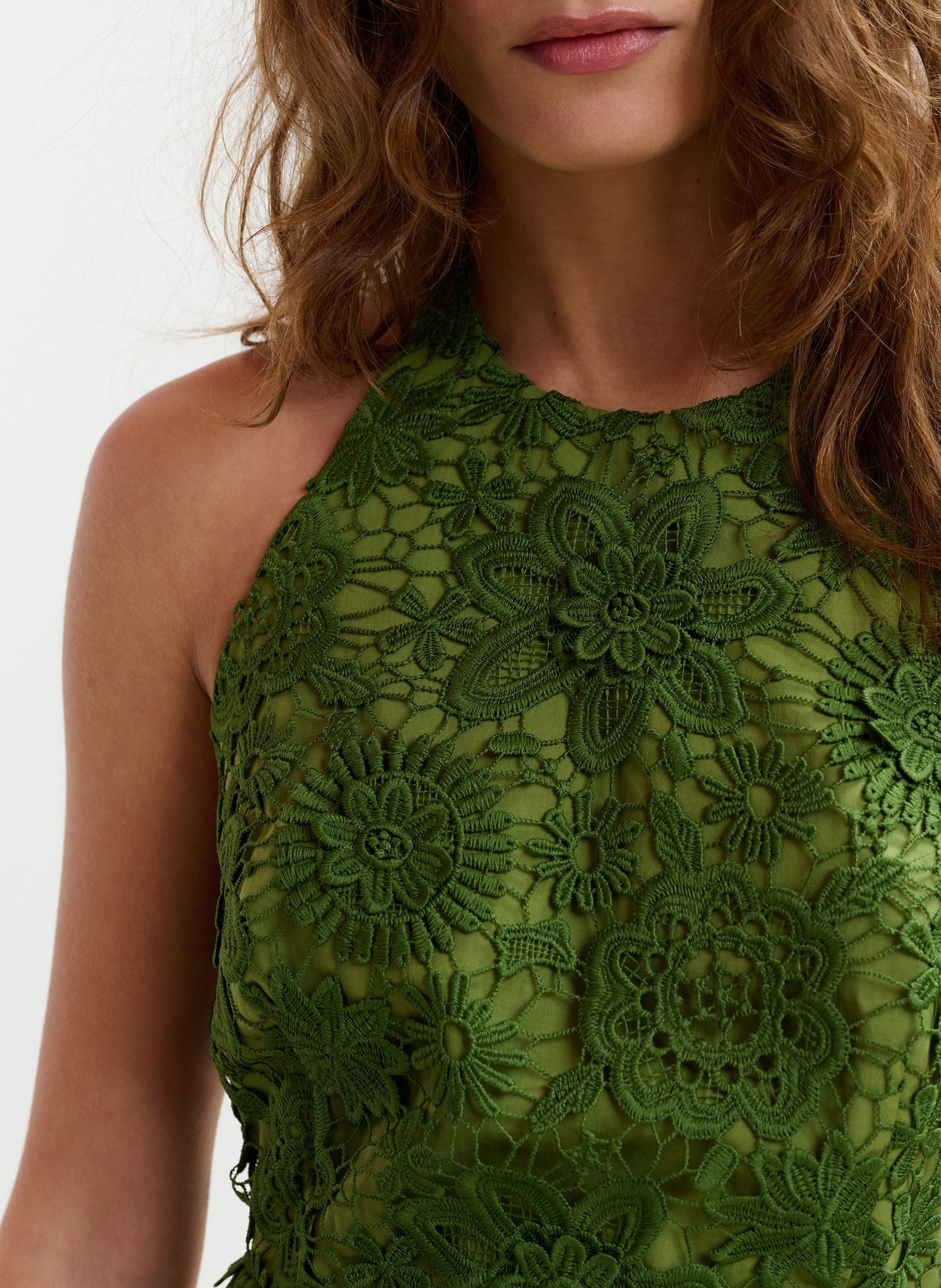 Fitted top in floral lace. ESSENTIEL ANTWERP Green
