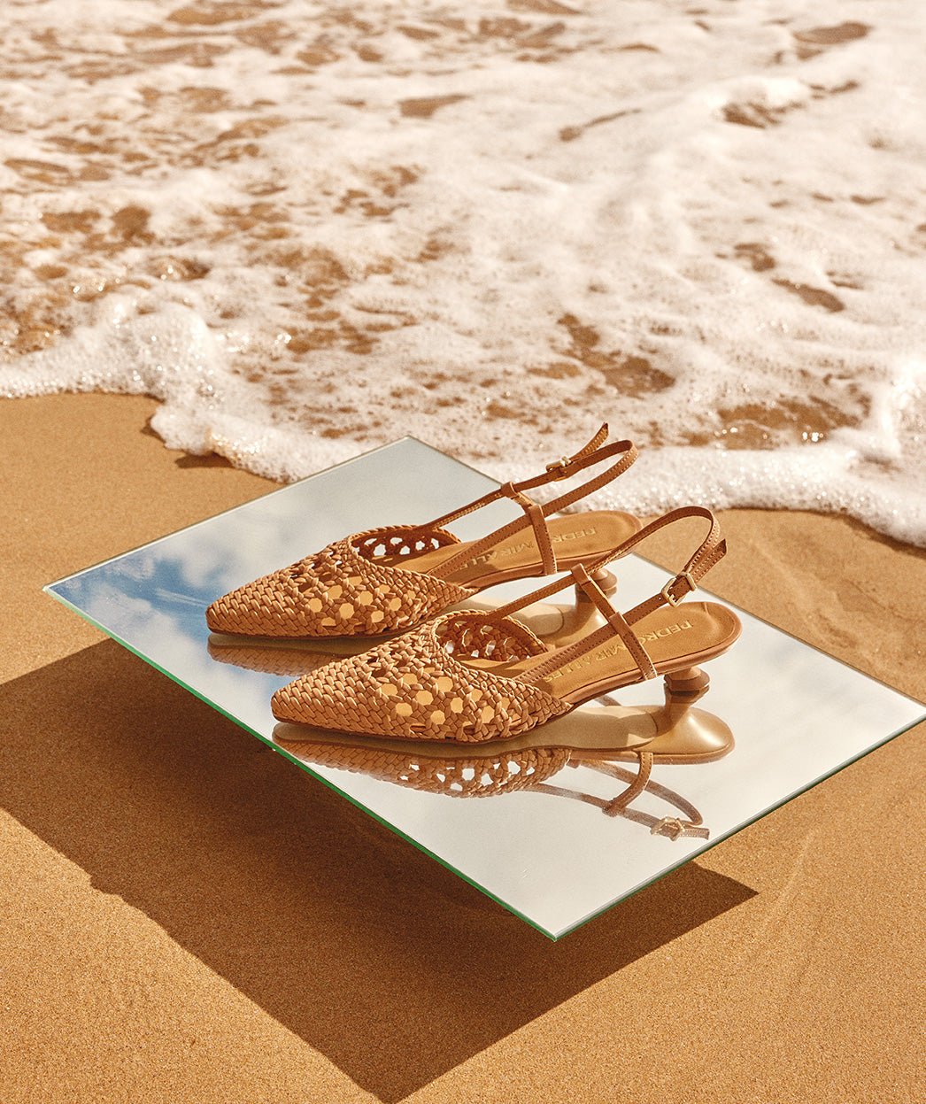 Brown woven pointed-toe shoes with open heel. PEDRO MIRALLES Brown