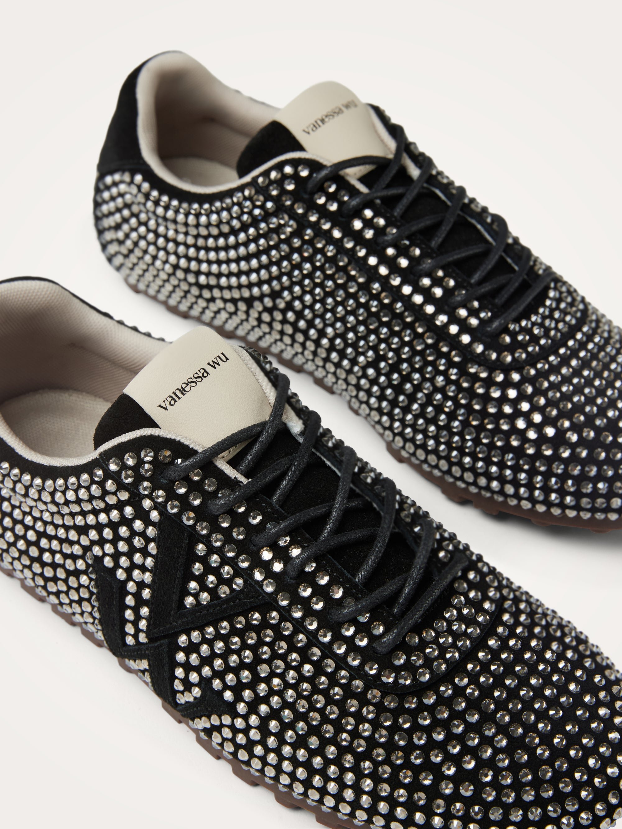 Monogram-embellished sneakers adorned with rhinestones on a serrated thin sole. VANESSA WU Black