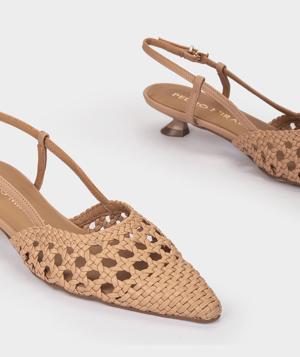 Brown woven pointed-toe shoes with open heel. PEDRO MIRALLES Brown