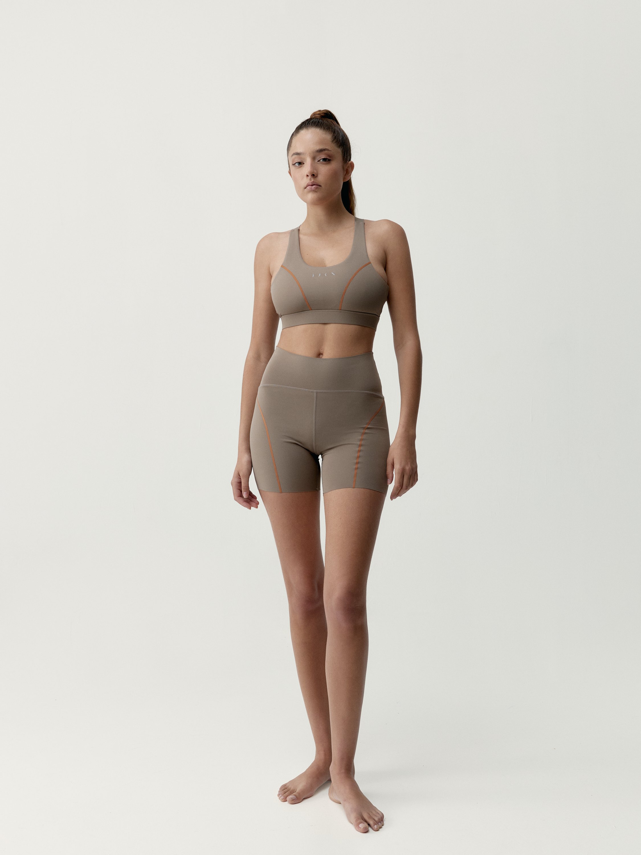 Performance sports short tight fitting black BORN Brown