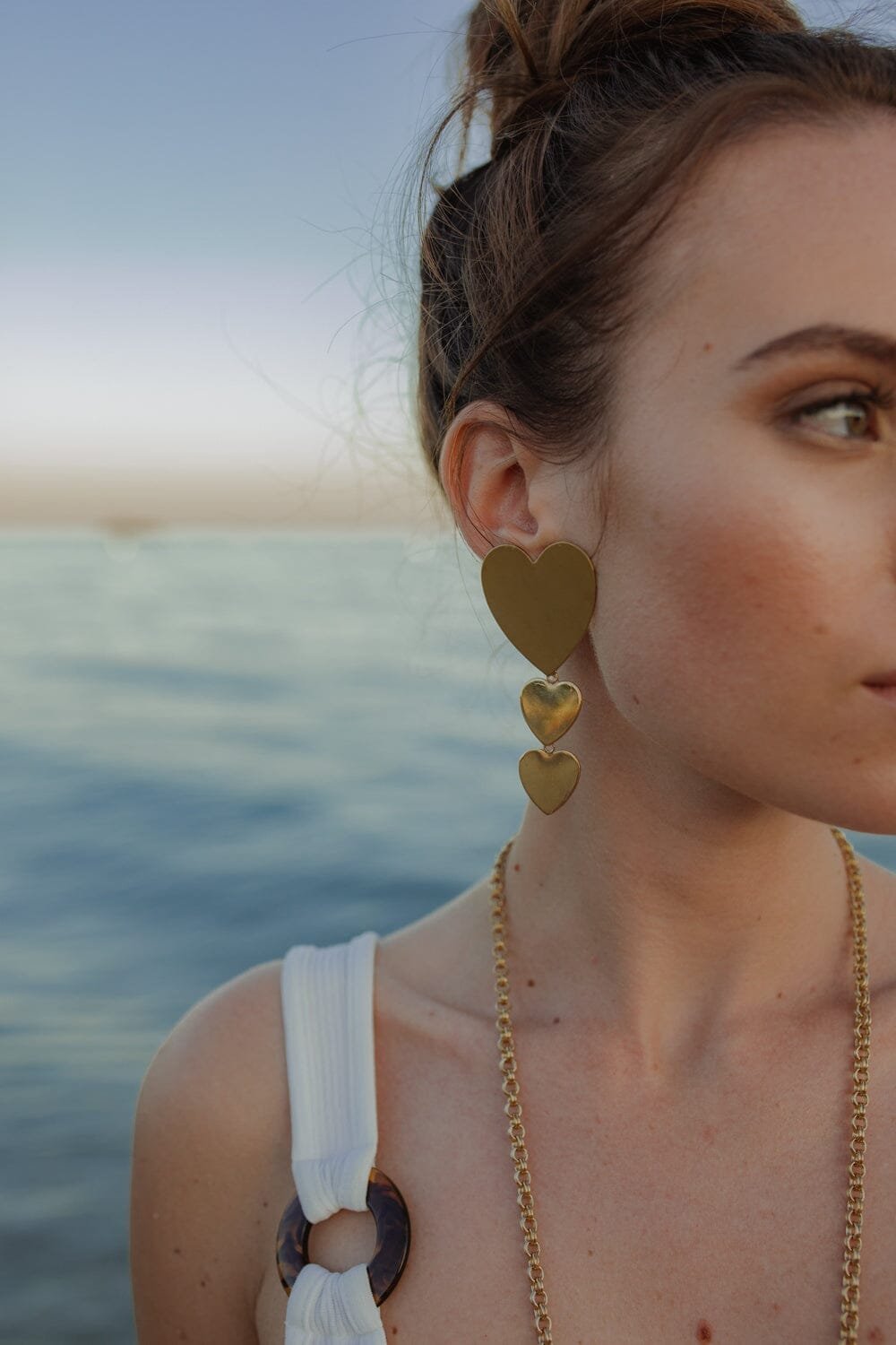 Dangling heart-shaped gold-plated stud earrings Golden