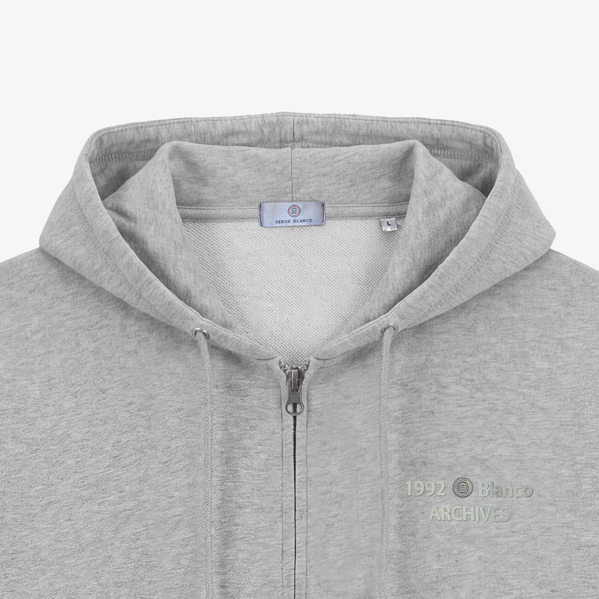 Sweat à capuche zippé teinture old en coton SERGE BLANCO Gris